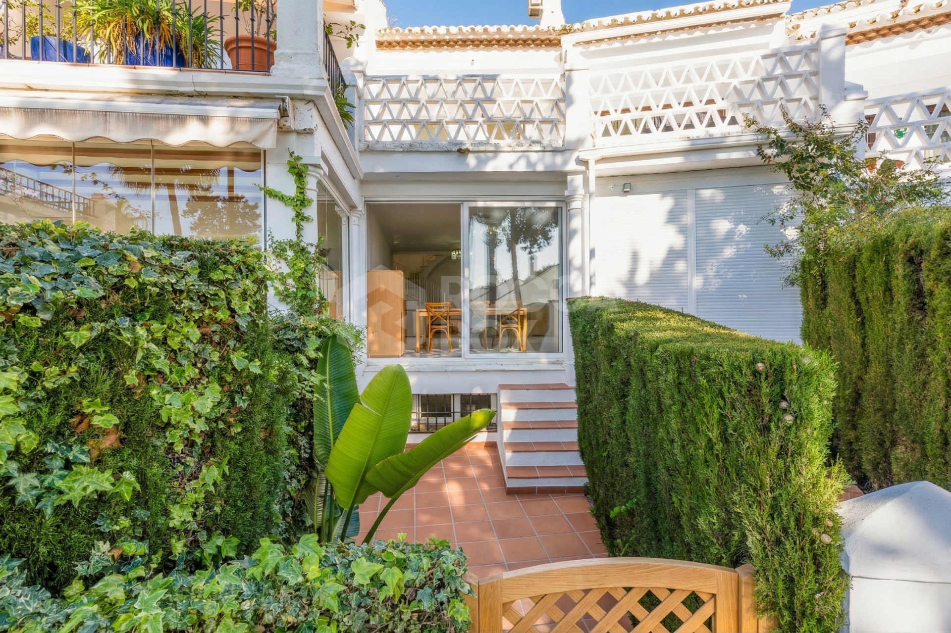 South-facing four-bedroom townhouse located in the gated community of Montepiedra , Nagueles within the Golden Mile, Marbella