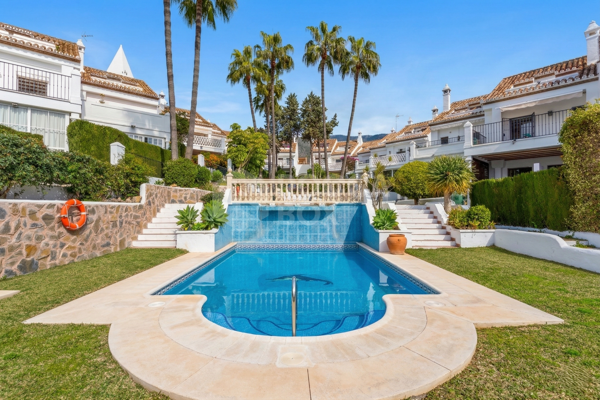 South-facing four-bedroom townhouse located in the gated community of Montepiedra , Nagueles within the Golden Mile, Marbella
