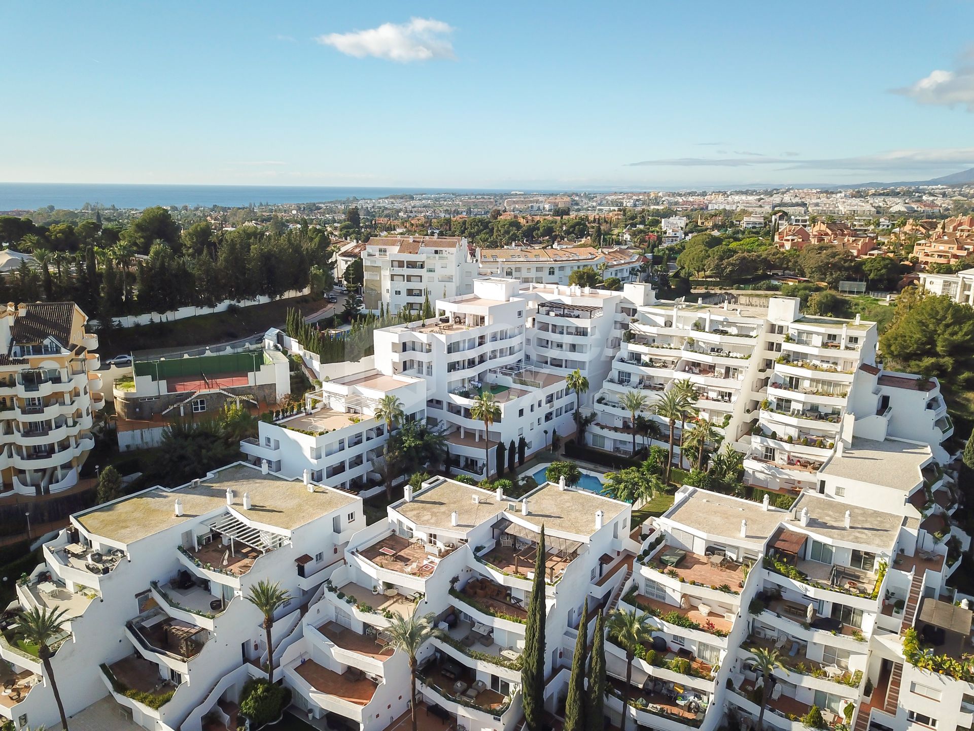 Beautifully reformed two bedroom apartment in the gated community of Jardines de Andalucía, Nueva Andalucia with sea views