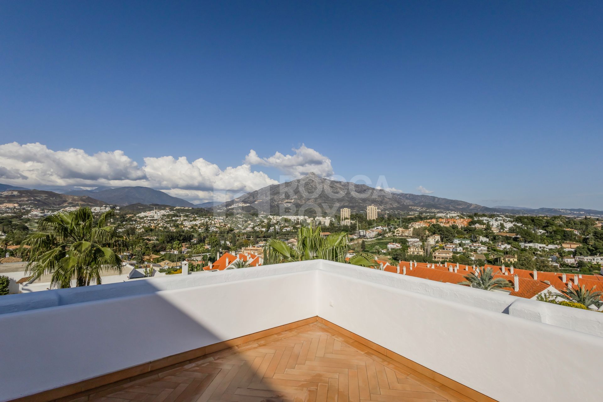 Beautifully reformed two bedroom apartment in the gated community of Jardines de Andalucía, Nueva Andalucia with sea views