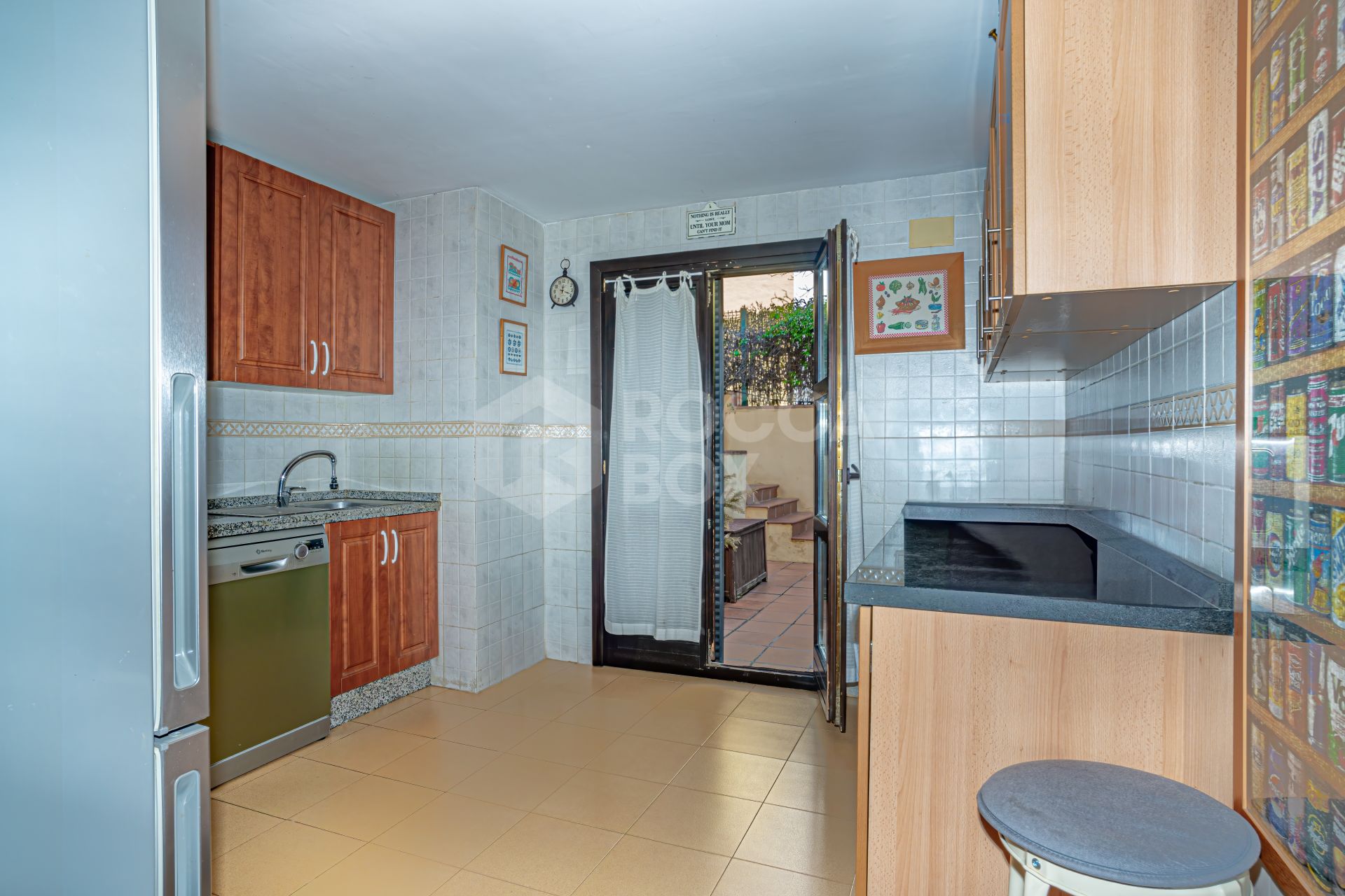 Fantastic four-bedroom townhouse in a gated community of Guadalmina Alta