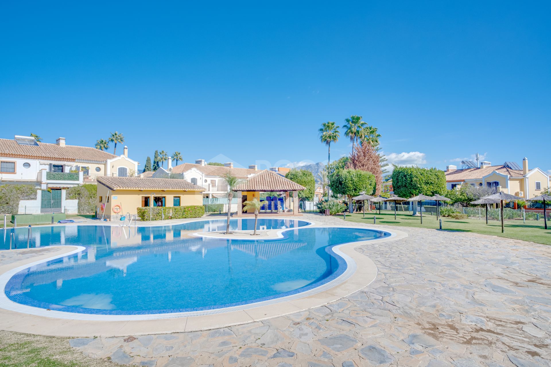 Fantastic four-bedroom townhouse in a gated community of Guadalmina Alta