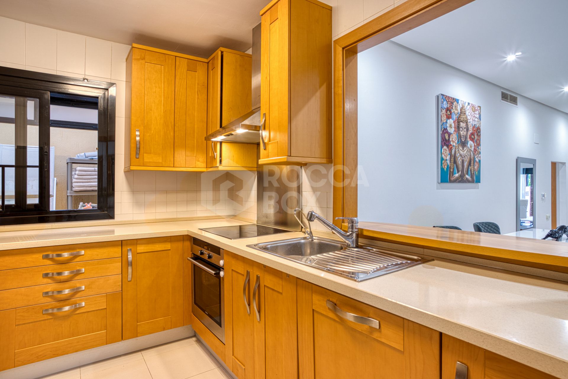 Fantastic west-facing three-bedroom apartment in Las Mimosas Beach Gardens, Nueva Andalucía.