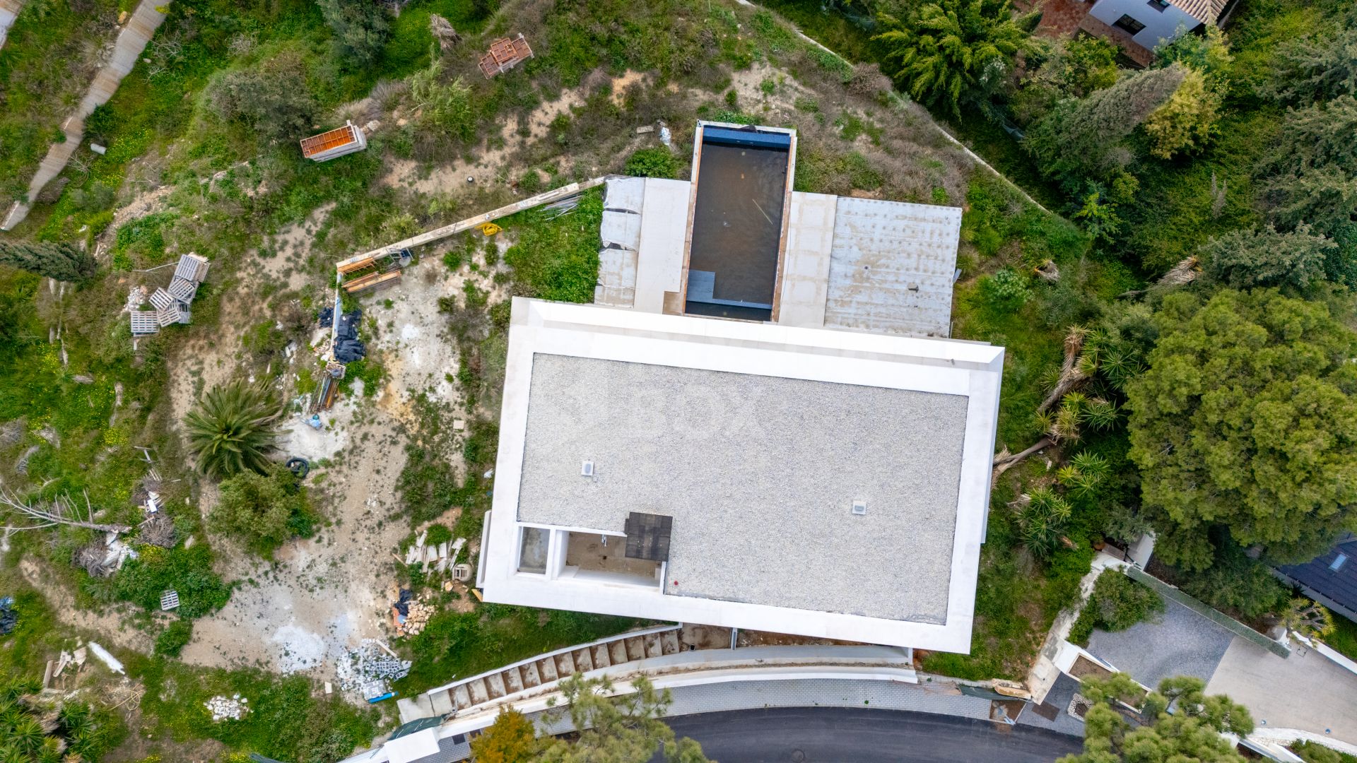 Experience unparalleled luxury with this soon-to-be-completed turnkey villa in the prestigious Hacienda Las Chapas