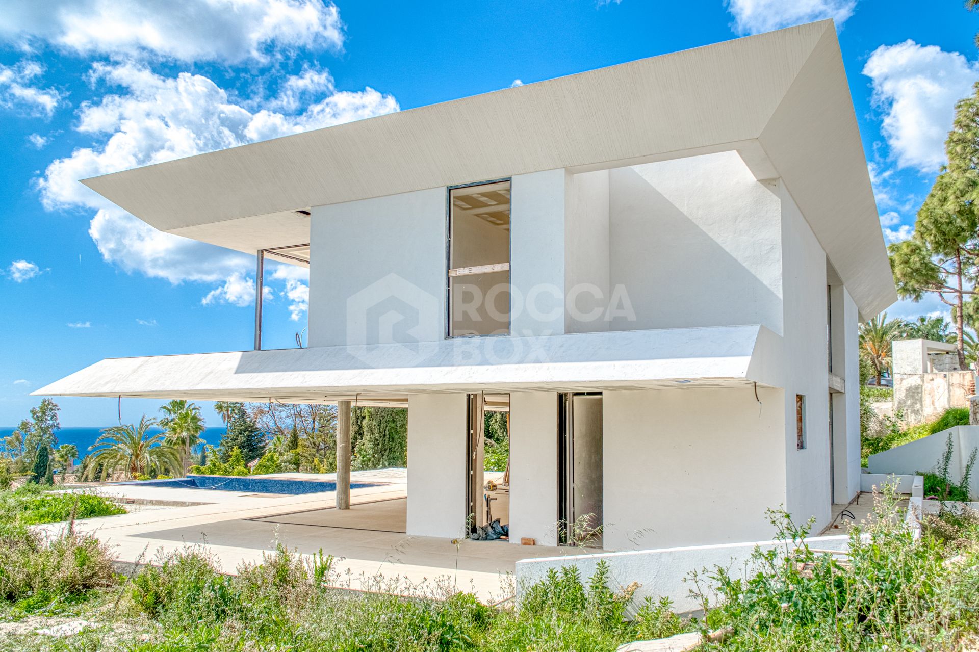 Experience unparalleled luxury with this soon-to-be-completed turnkey villa in the prestigious Hacienda Las Chapas