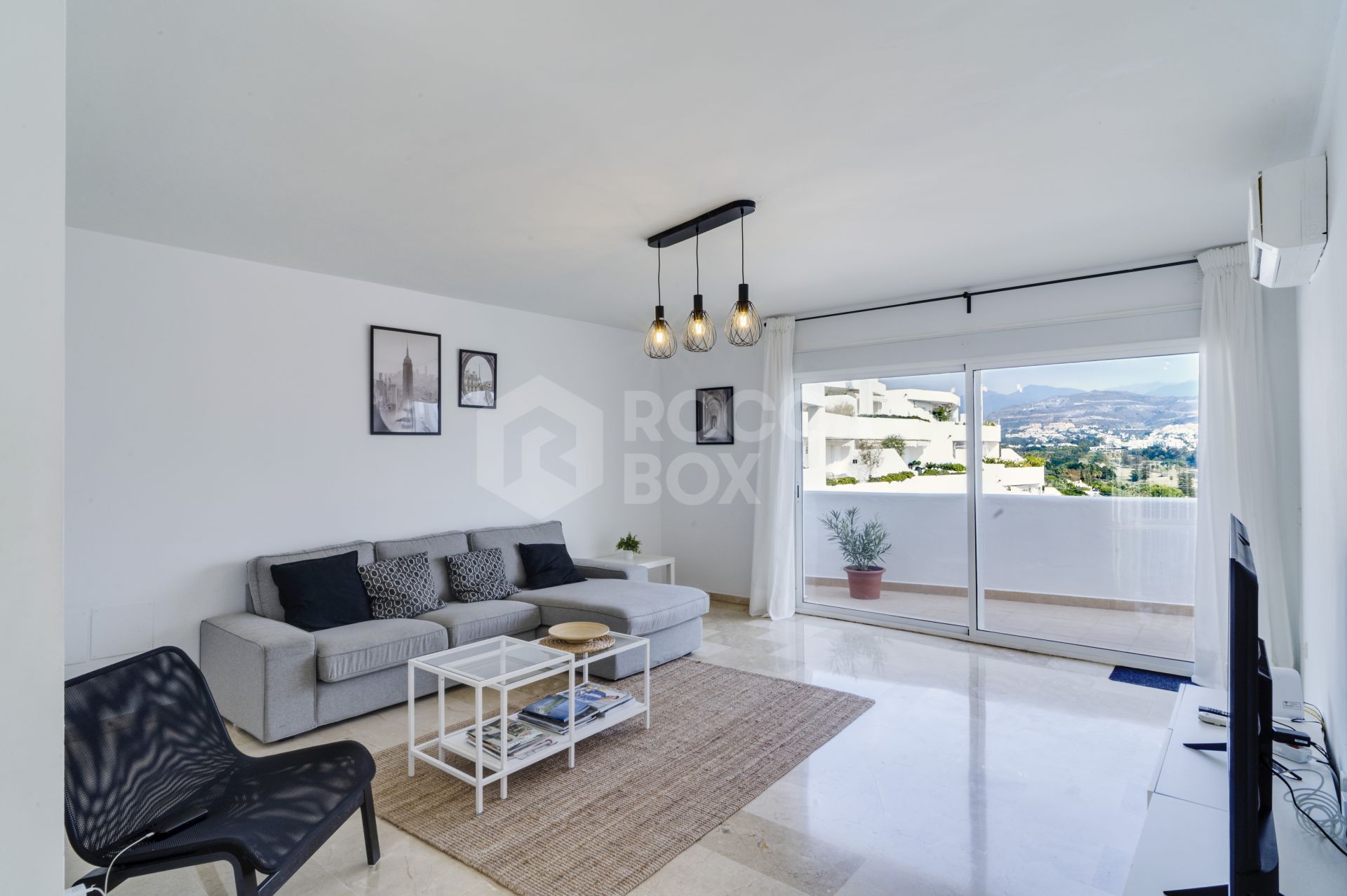 Incredible investment opportunity to purchase a two bedroom apartment in the gated community of Jardines de Andalucía, Nueva Andalucia