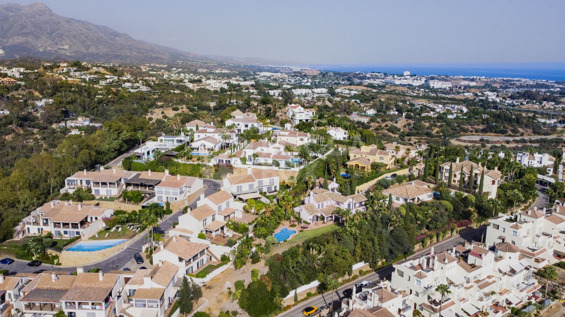 Charming five-bedroom Andalusian style villa in the gated community Puerto de Los Almendros, Benahavis with guest apartment