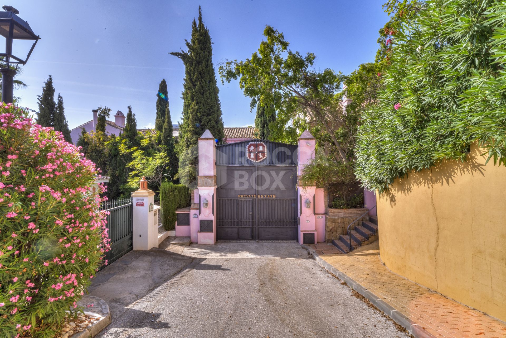 Charming five-bedroom Andalusian style villa in the gated community Puerto de Los Almendros, Benahavis with guest apartment