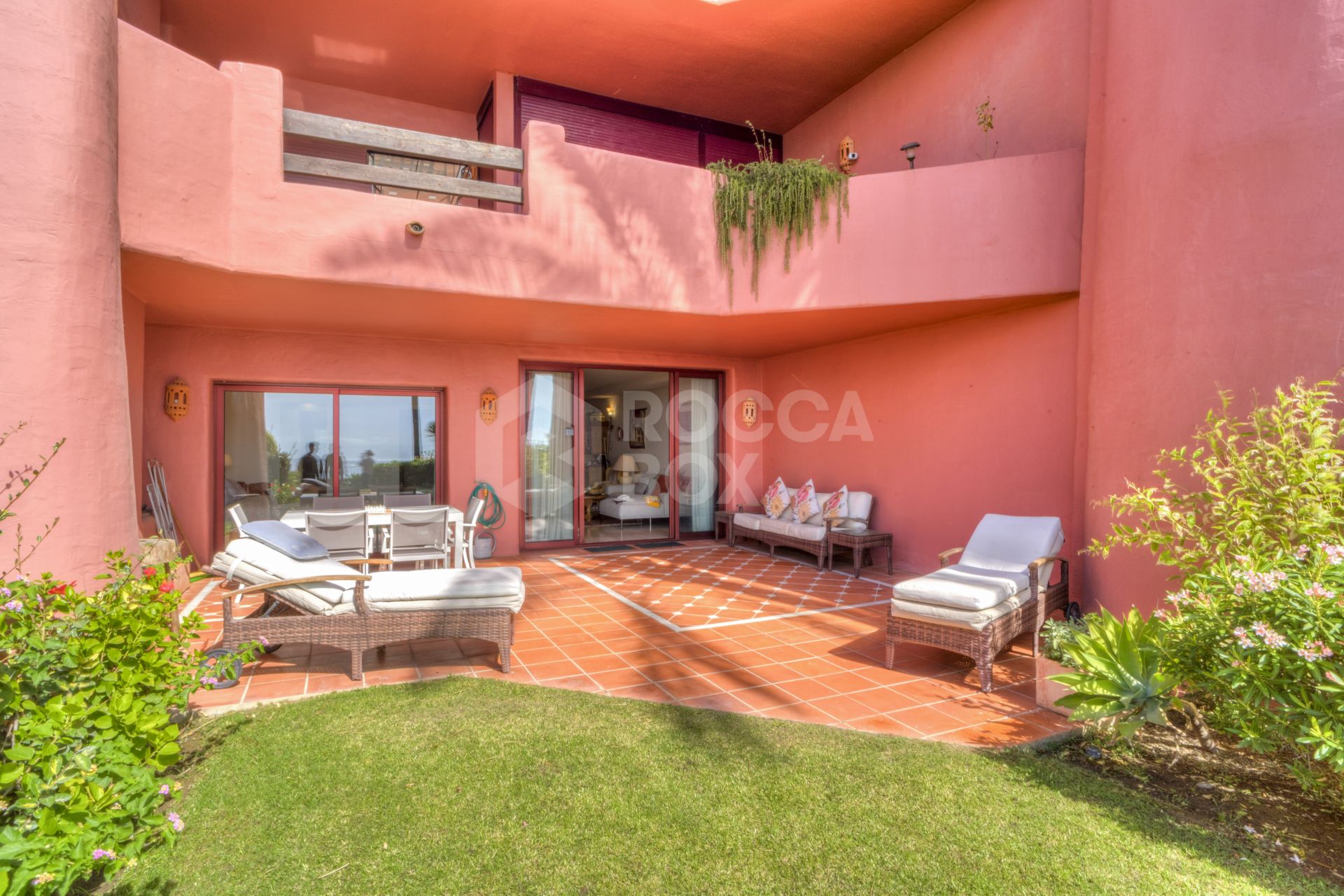 Impressive two bedroom, beach front ground floor apartment located in the luxury gated community of Menara Beach, Estepona.