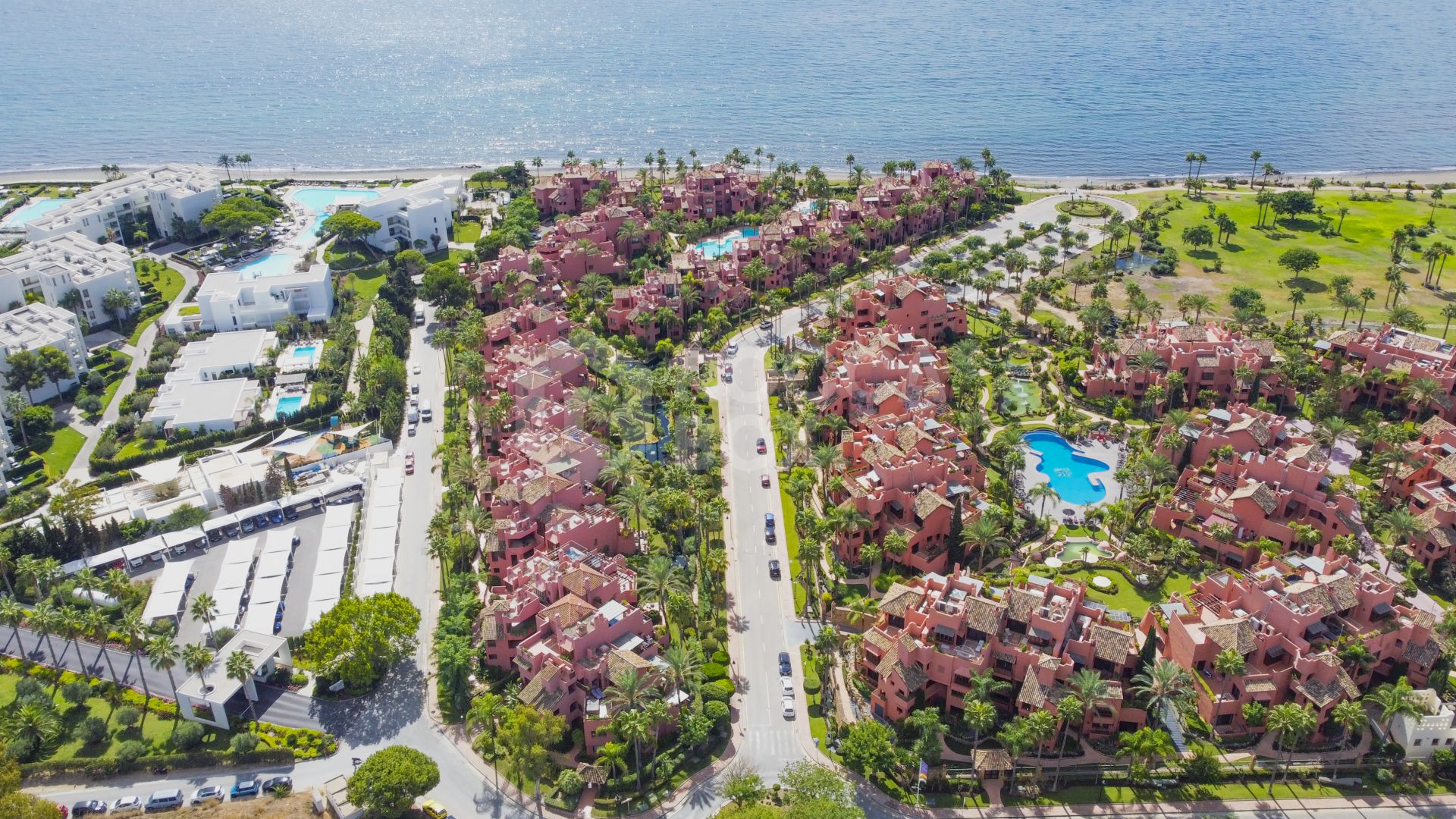 Impressive two bedroom, beach front ground floor apartment located in the luxury gated community of Menara Beach, Estepona.