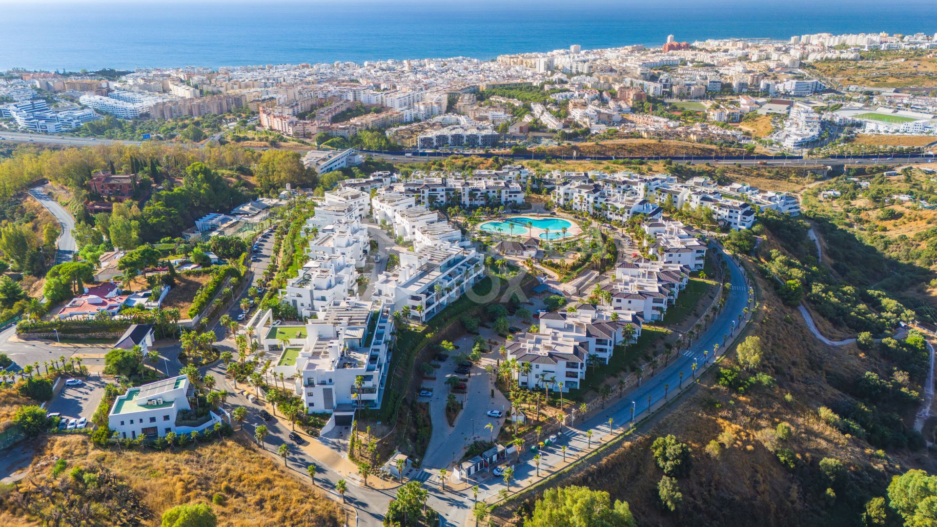 Stylish south-facing three bedroom apartment with spectacular sea views, located in the prestigious Mirador de Estepona Hills