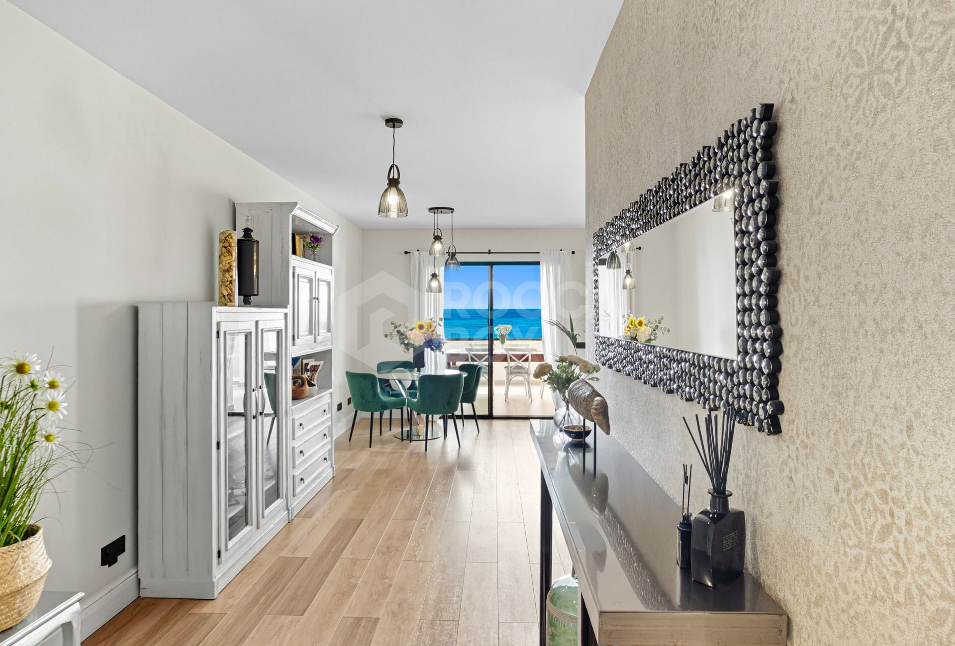 Stylish south-facing three bedroom apartment with spectacular sea views, located in the prestigious Mirador de Estepona Hills