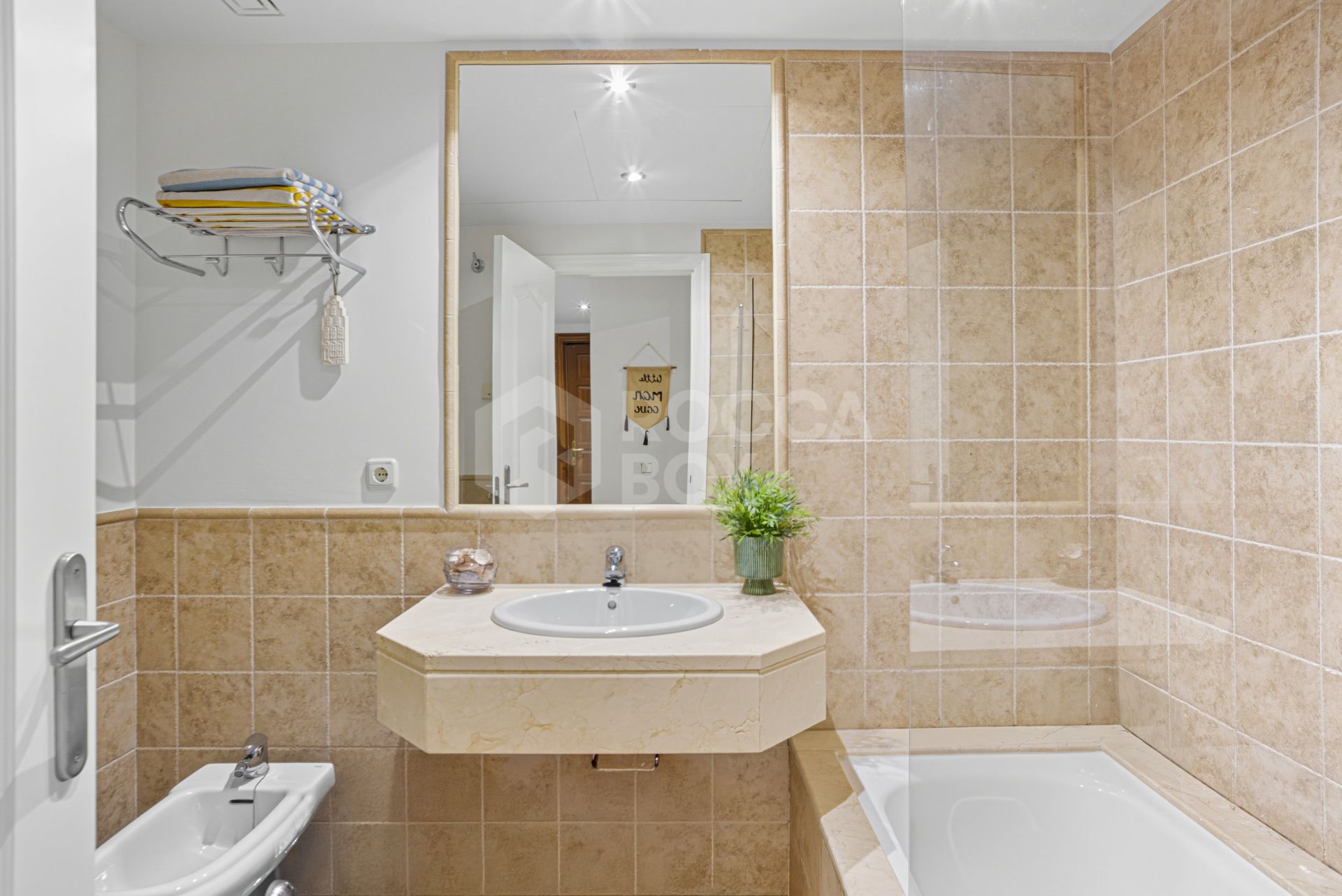 Wonderful two-bedroom, ground floor apartment located in the sought after gated community of Benatalaya