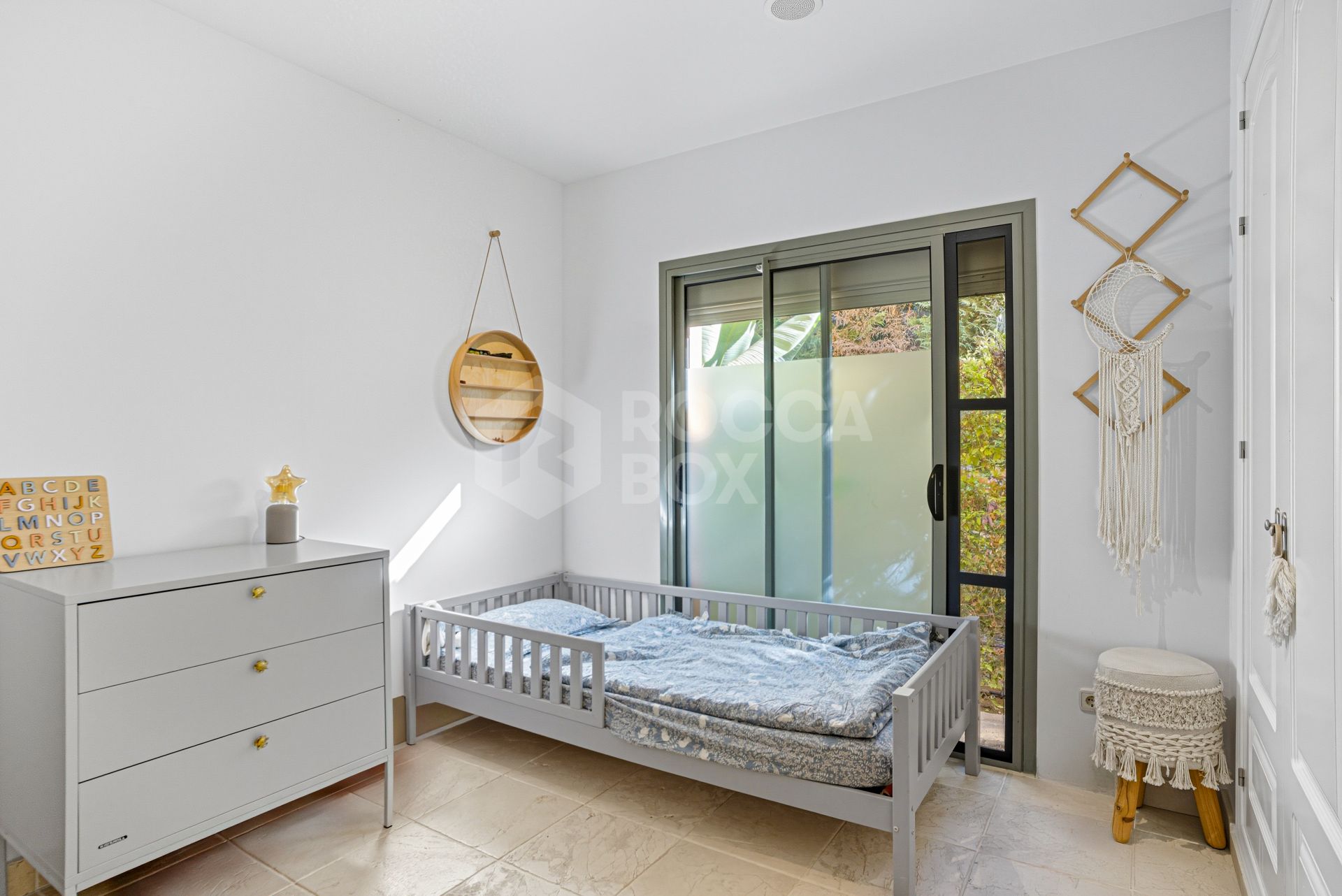 Wonderful two-bedroom, ground floor apartment located in the sought after gated community of Benatalaya