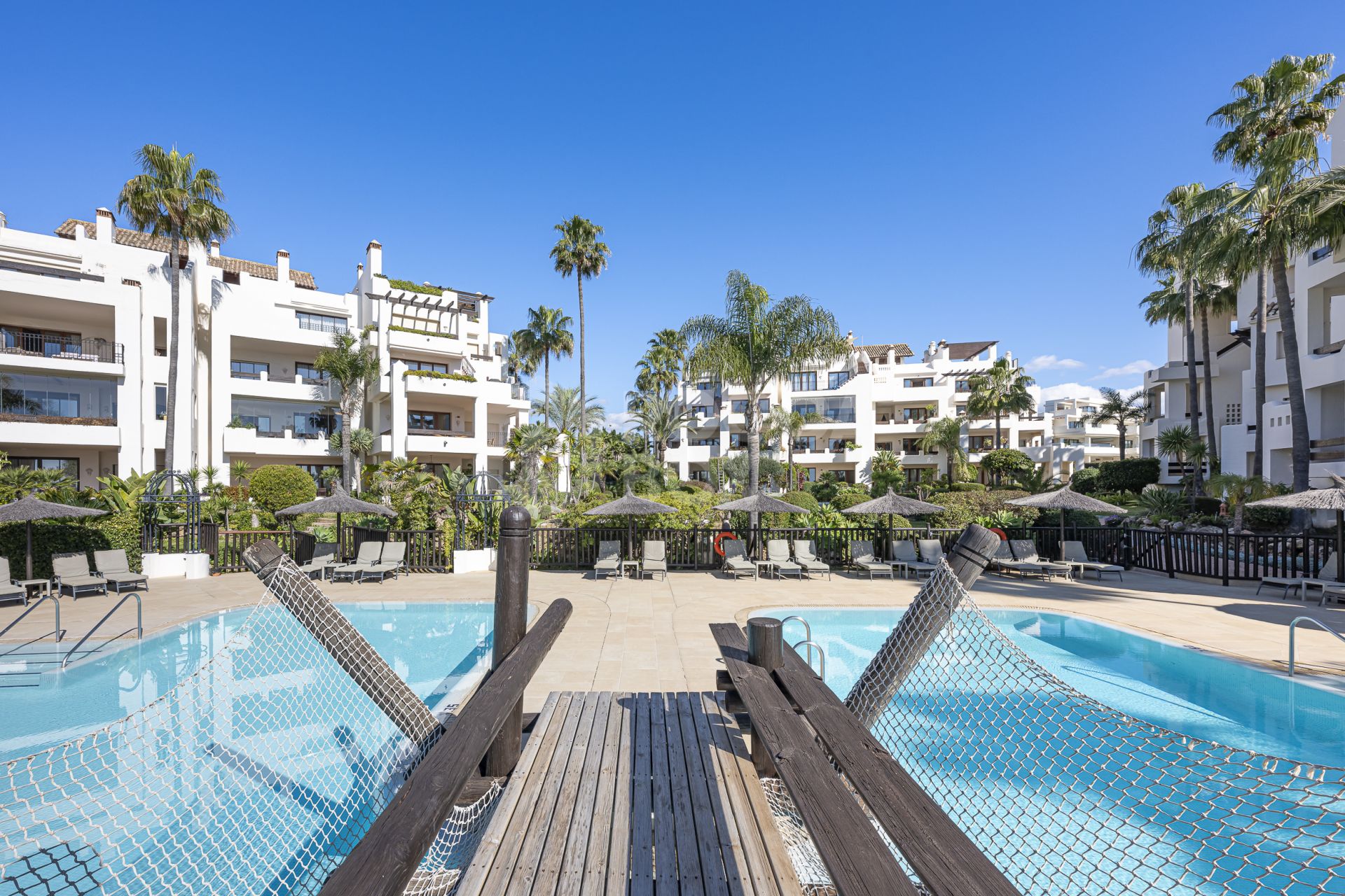 Beautifully renovated, south facing three-bedroom apartment located in the prestigious gated community of Bahia del Velerin, Estepona