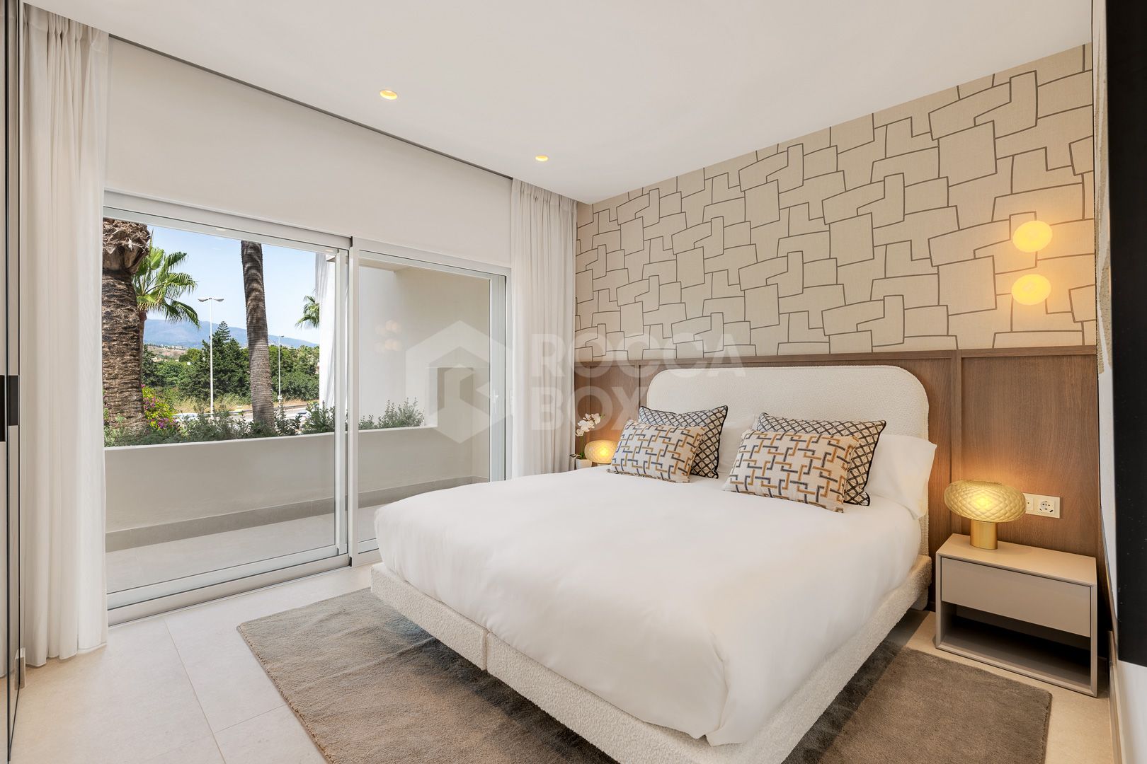 Beautifully renovated, south facing three-bedroom apartment located in the prestigious gated community of Bahia del Velerin, Estepona