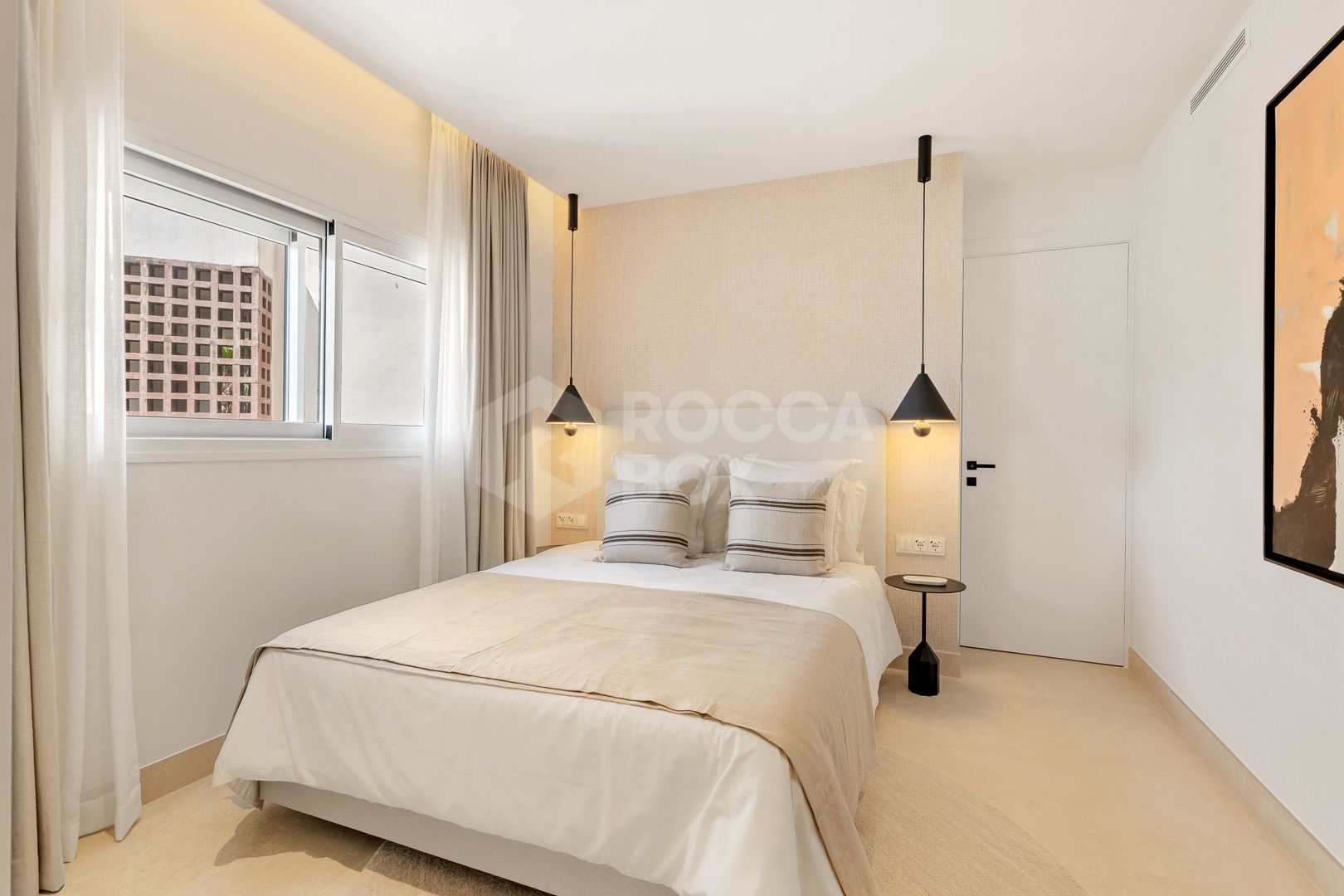 Beautifully renovated, south facing three bedroom penthouse located in prestigious beachfront community Bahia del Velerin, Estepona.