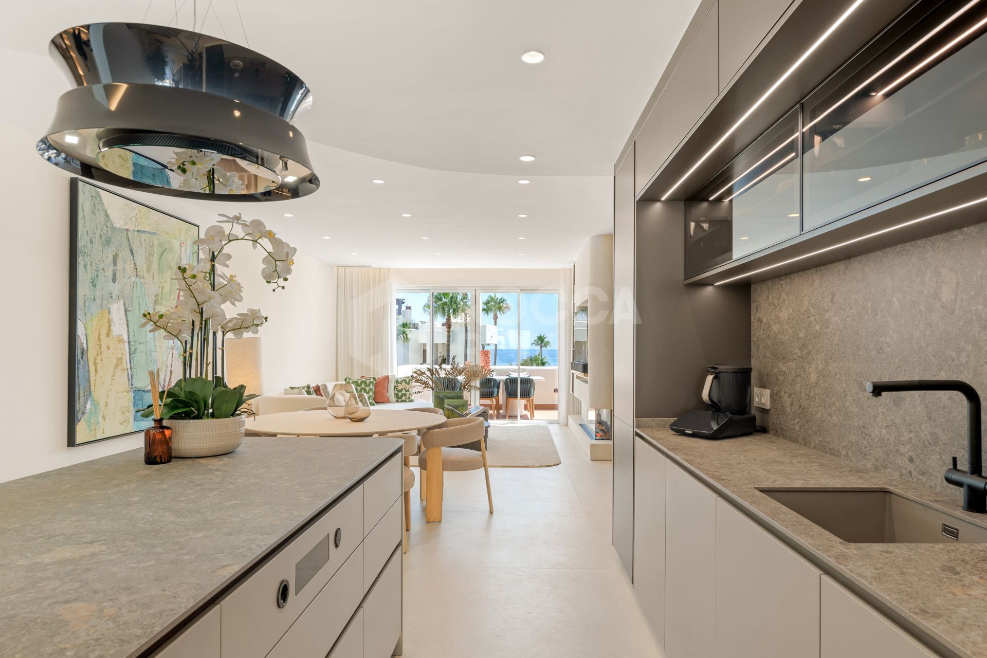 Stunning south-facing three bedroom penthouse located in the exclusive gated community of Bahia Del Velerin, Estepona.