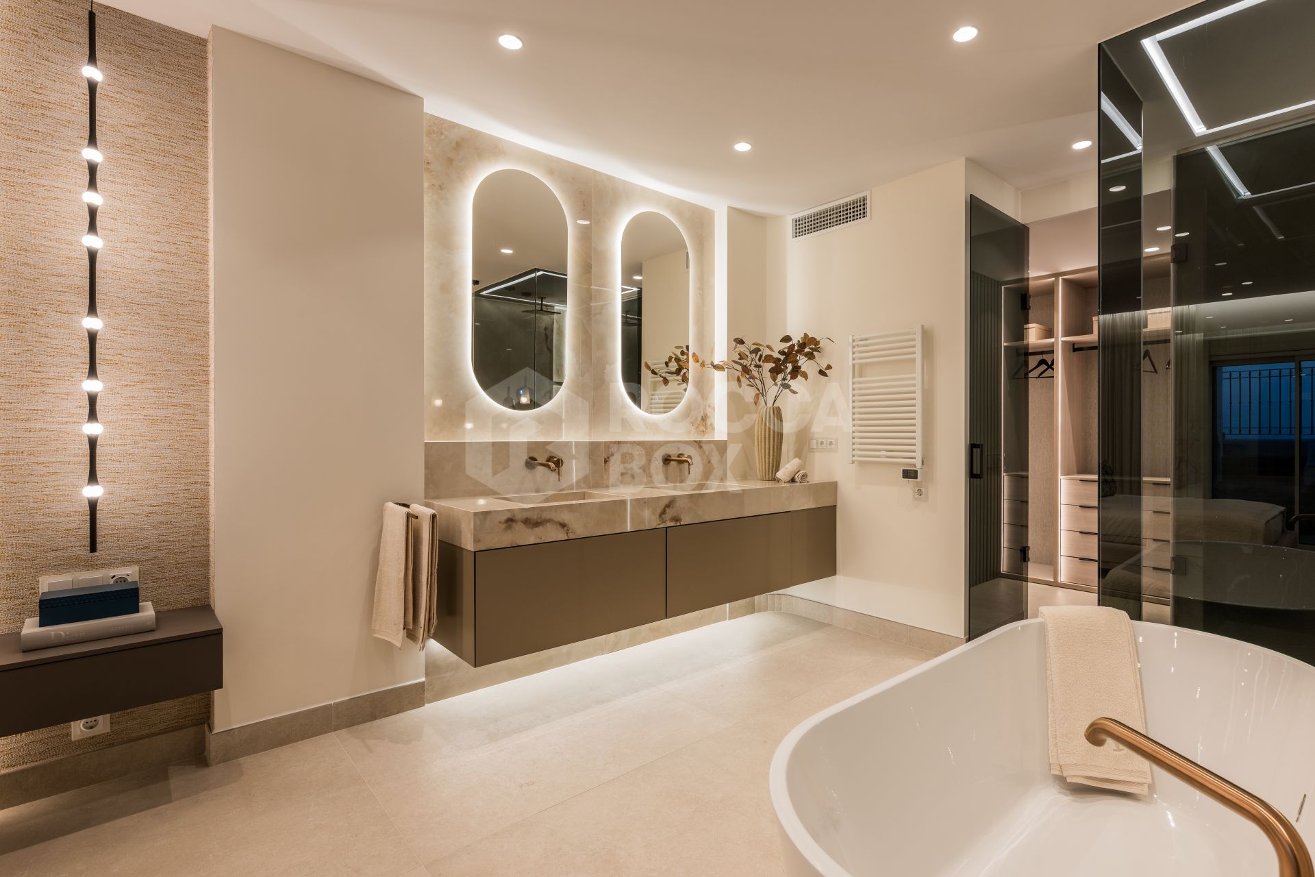 Stunning south-facing three bedroom penthouse located in the exclusive gated community of Bahia Del Velerin, Estepona.