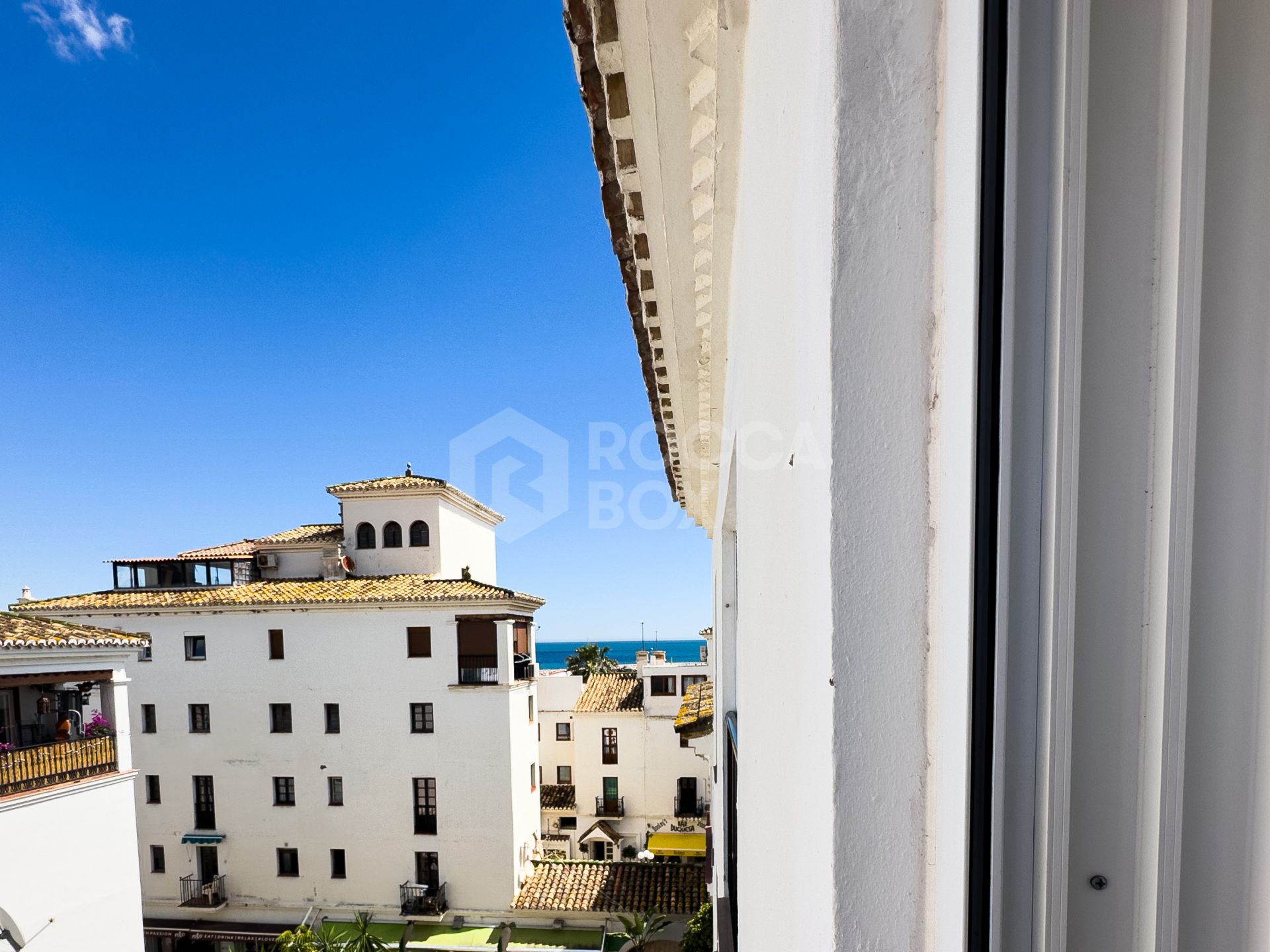 Duplex Penthouse in Puerto de la Duquesa with Partial Sea and Marina Views.