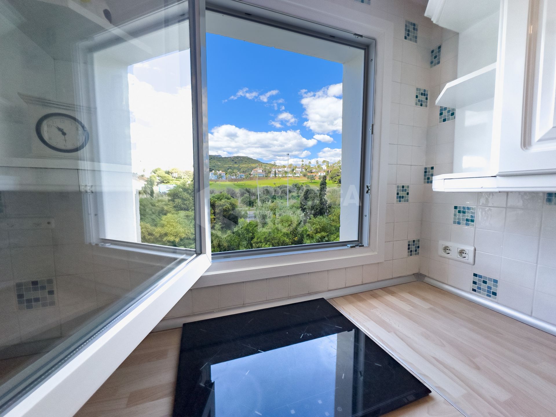 Duplex Penthouse in Puerto de la Duquesa with Partial Sea and Marina Views.