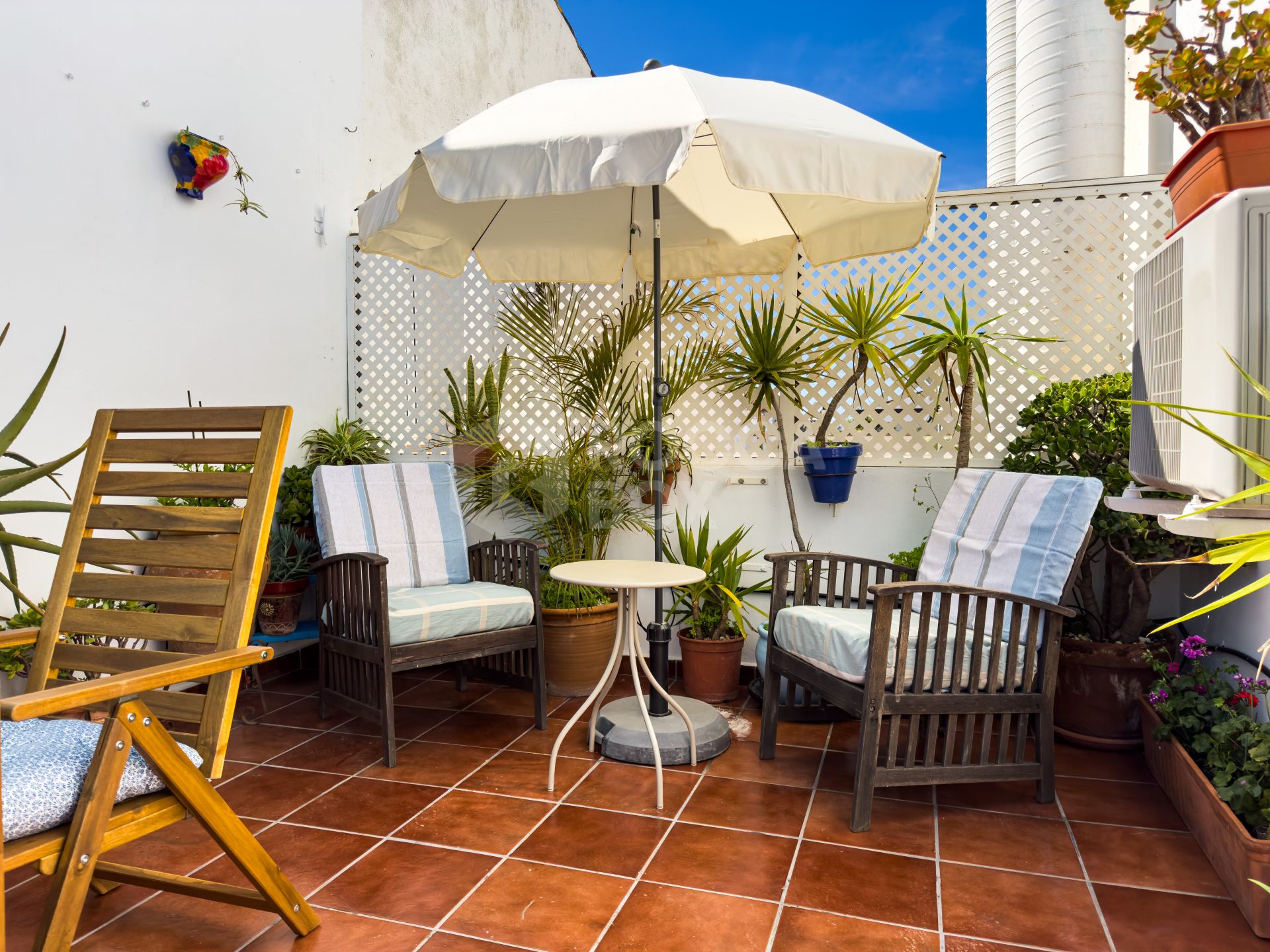 Duplex Penthouse in Puerto de la Duquesa with Partial Sea and Marina Views.