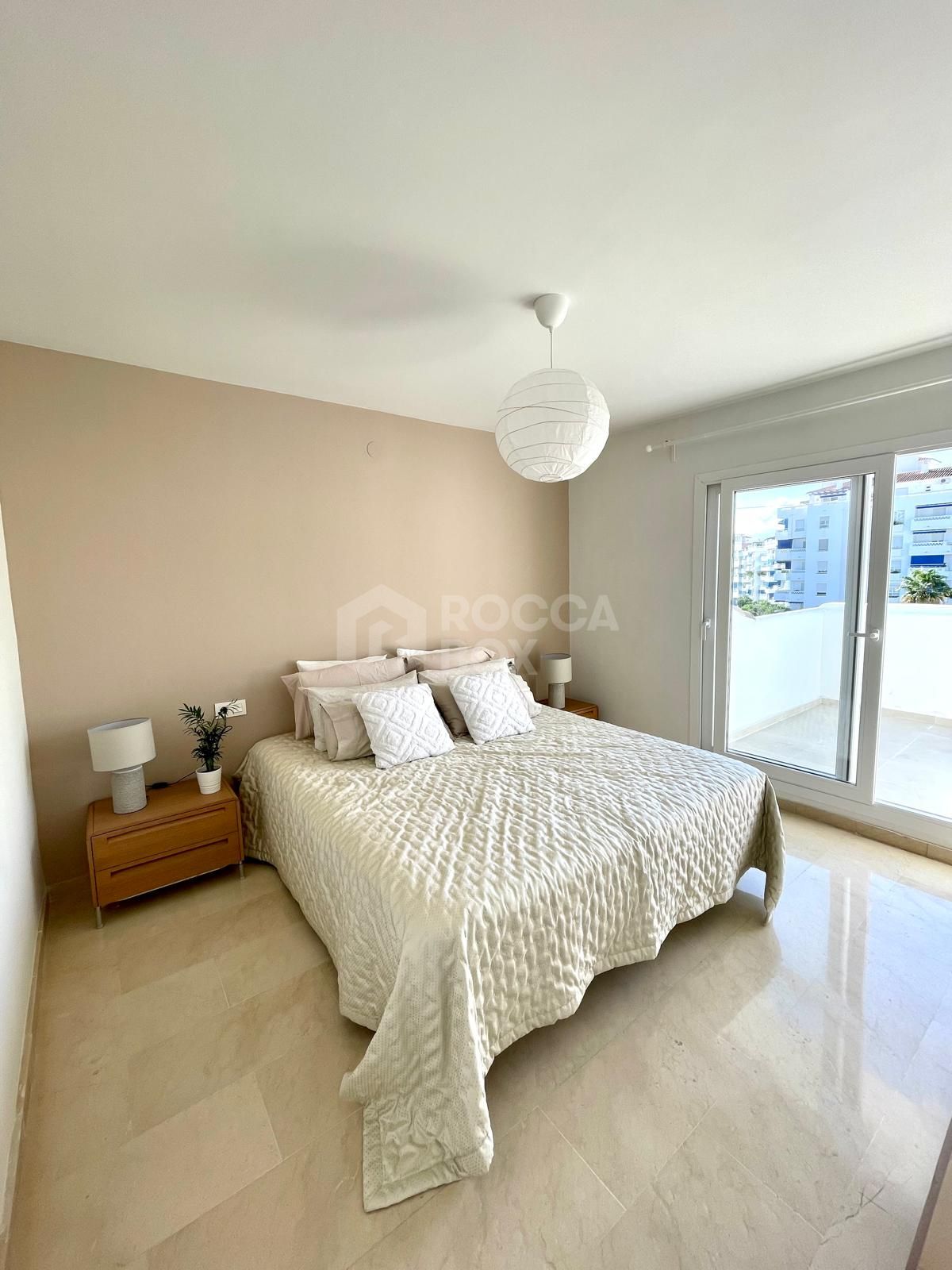 Elegant Two-Bedroom Apartment with Mountain Views and Prime Amenities