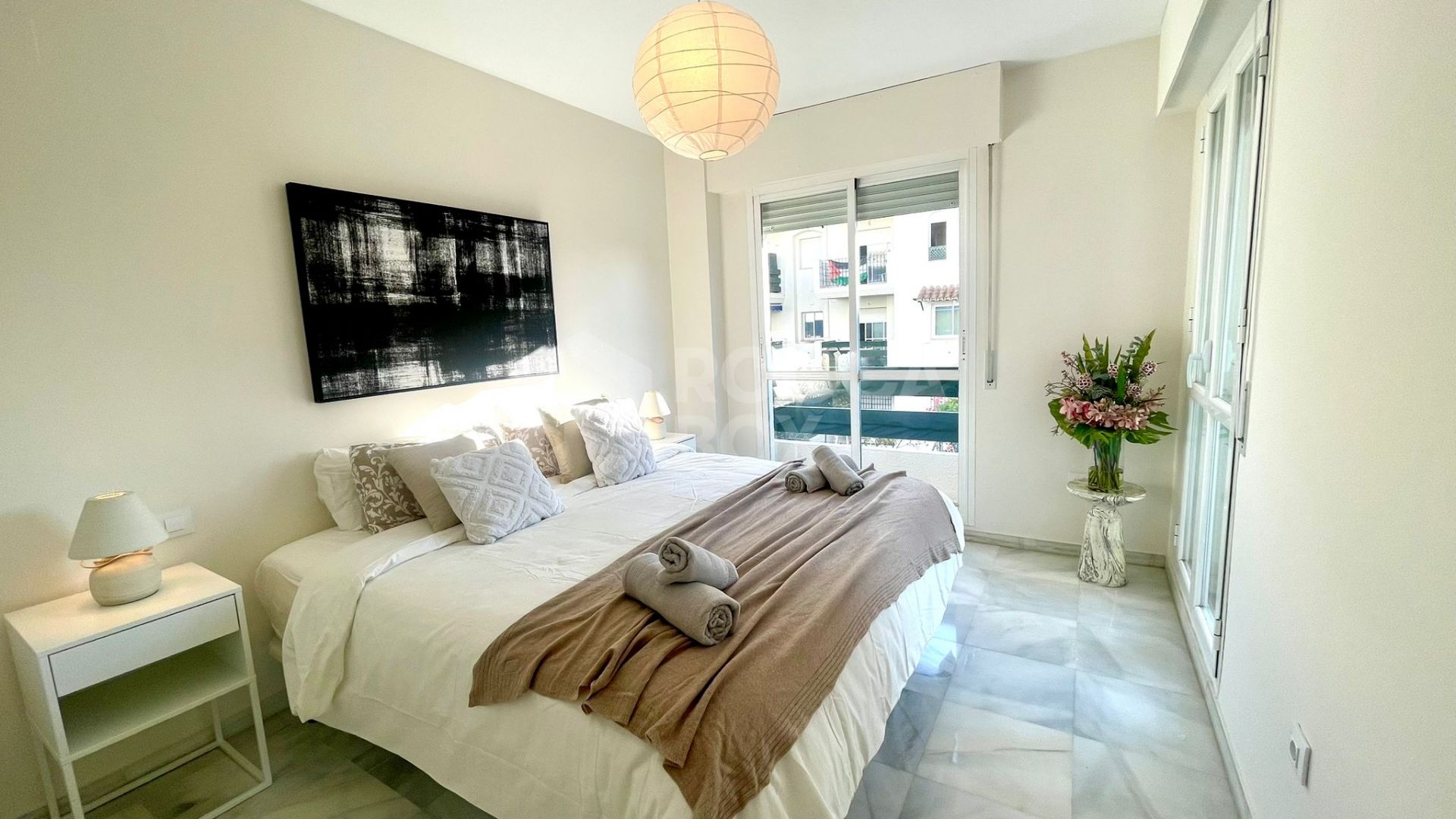 Elegant Two-Bedroom Apartment with Terrace in Prestigious Gated Community