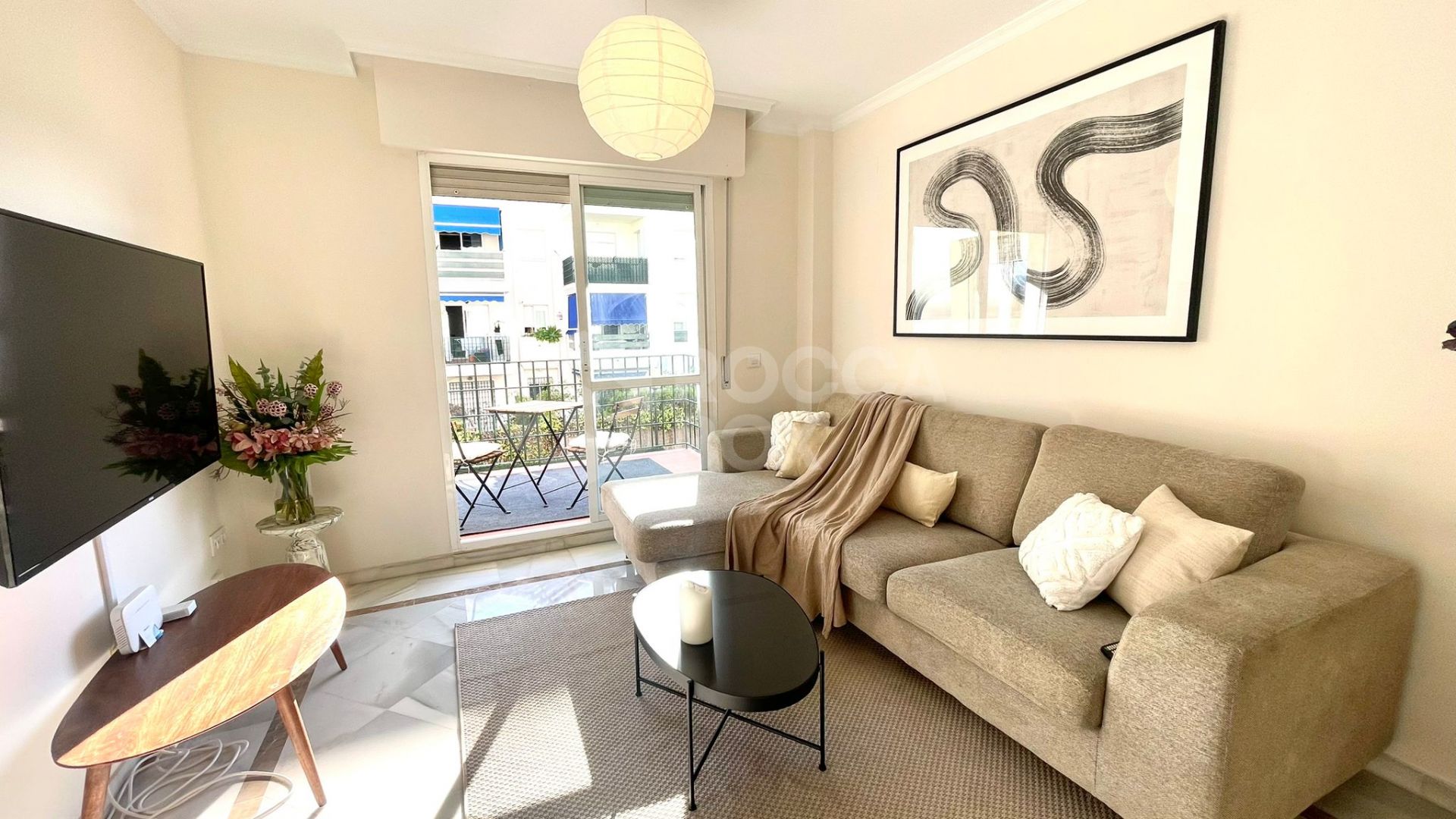 Elegant Two-Bedroom Apartment with Terrace in Prestigious Gated Community