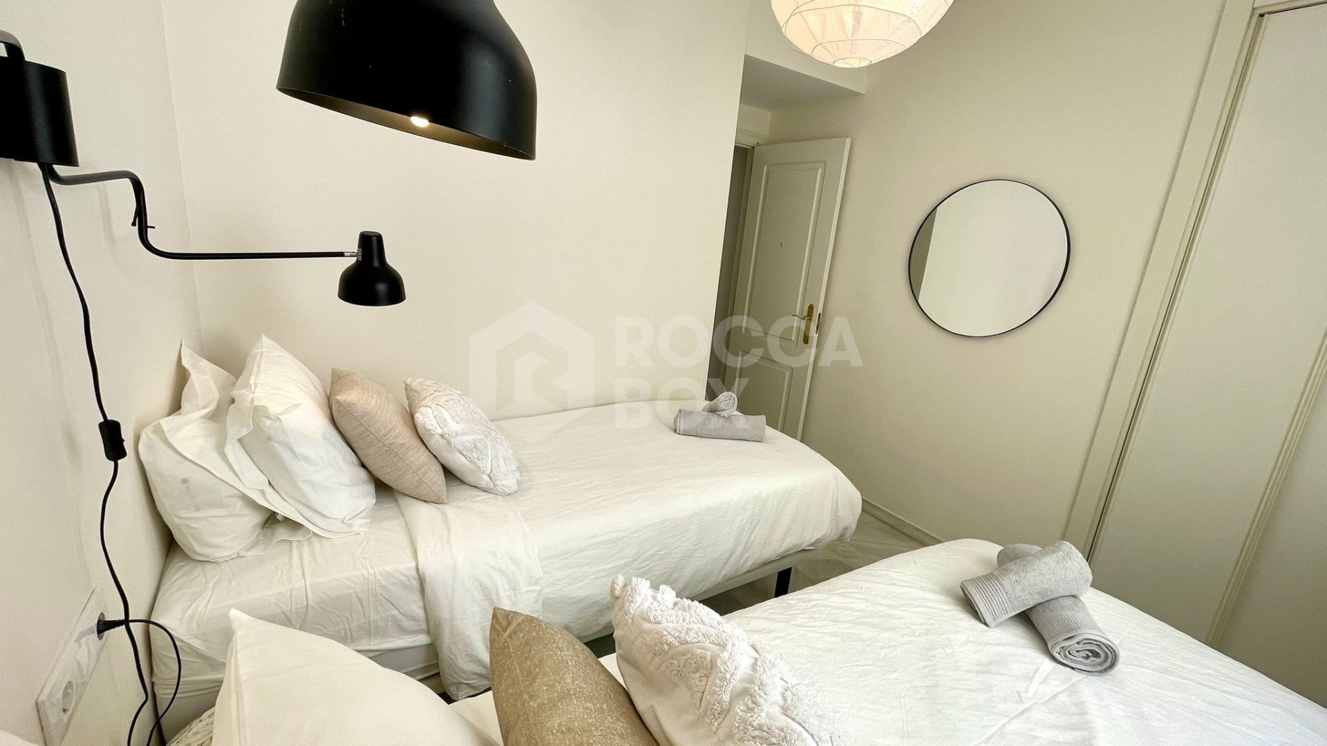 Elegant Two-Bedroom Apartment with Terrace in Prestigious Gated Community