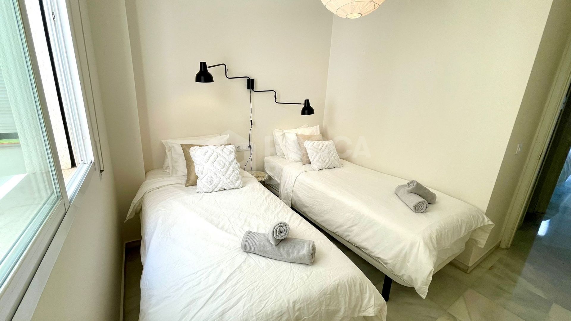 Elegant Two-Bedroom Apartment with Terrace in Prestigious Gated Community