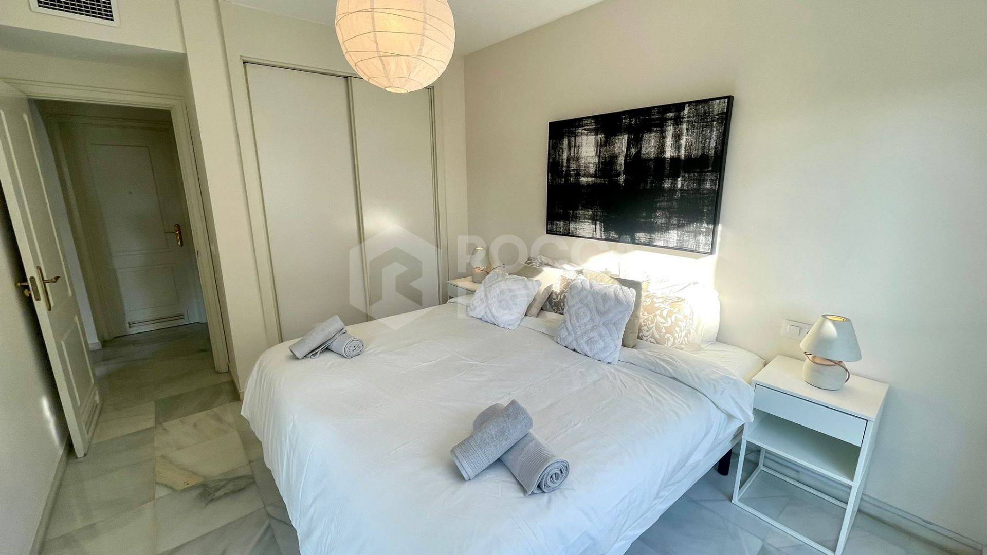 Elegant Two-Bedroom Apartment with Terrace in Prestigious Gated Community