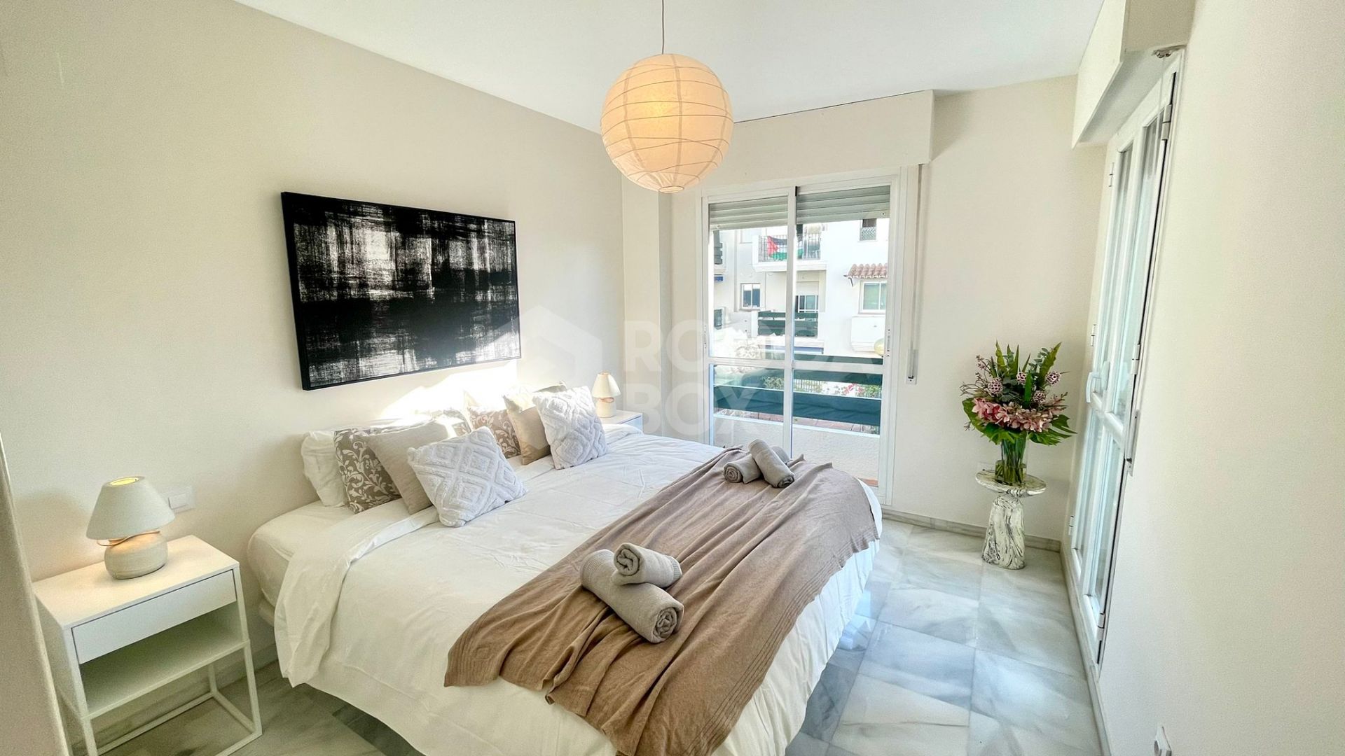 Elegant Two-Bedroom Apartment with Terrace in Prestigious Gated Community