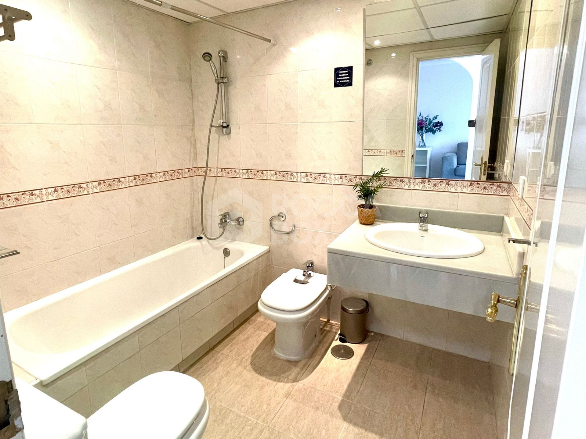 Elegant Two-Bedroom Apartment with Terrace in Prestigious Gated Community