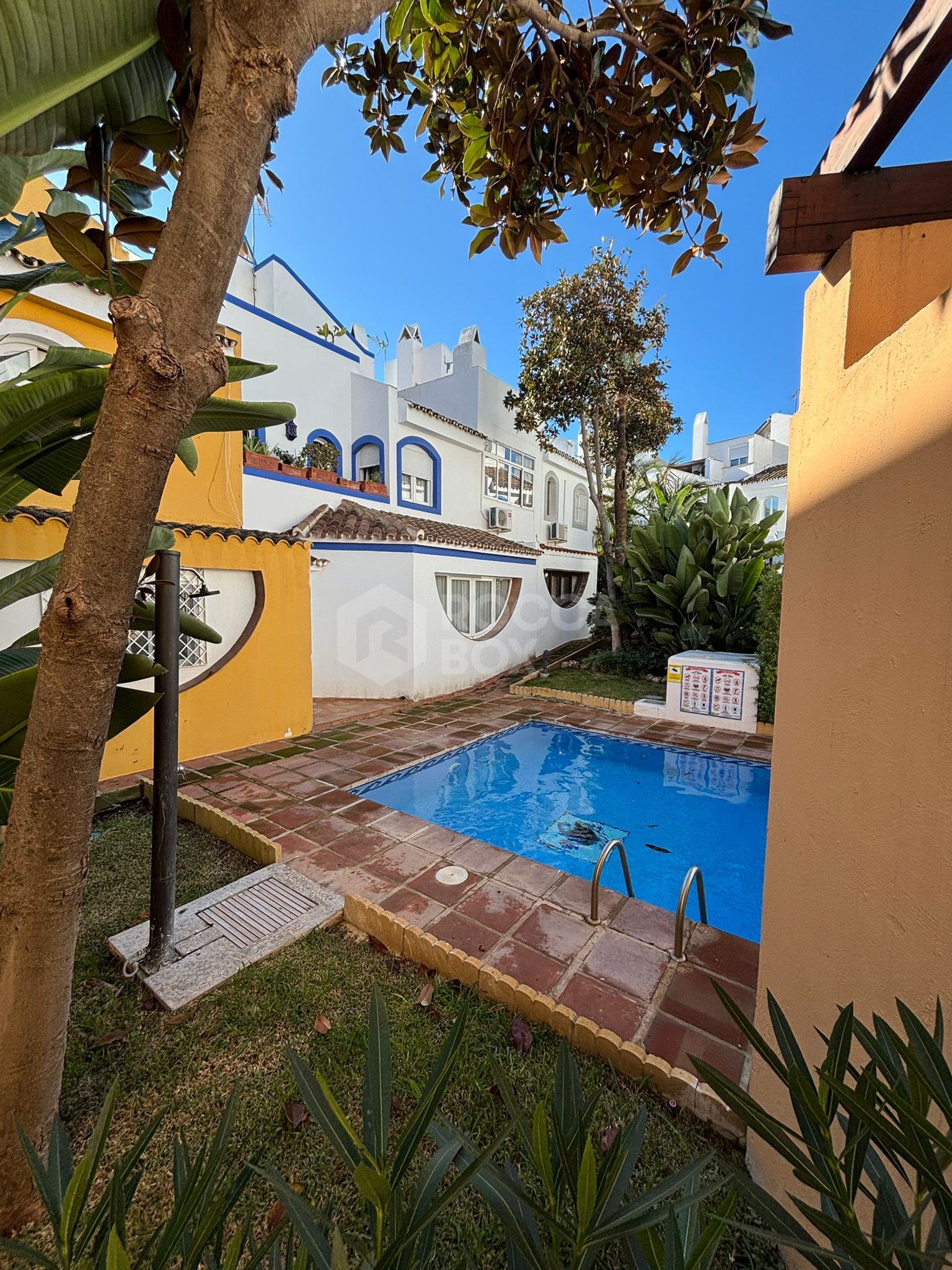 Elegant Three-Storey Town House with Communal Amenities in Tranquil Urbanisation