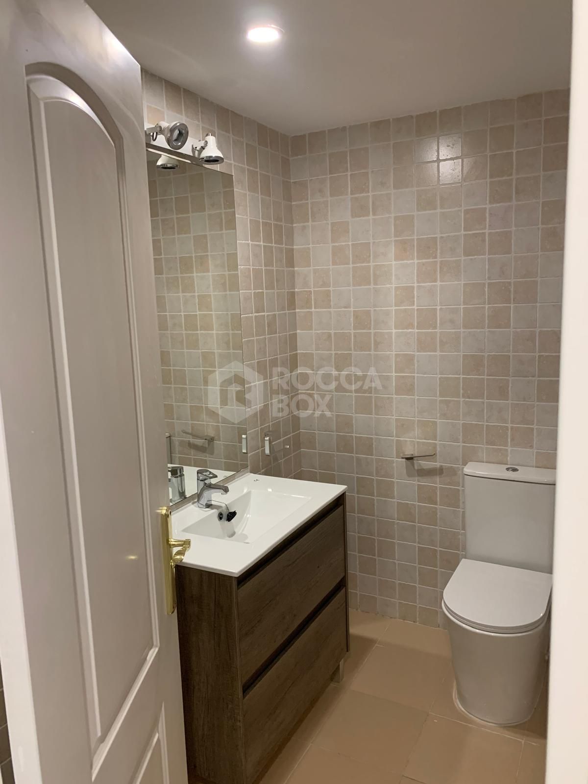 Elegant Two-Bedroom Apartment in Prestigious Gated Community