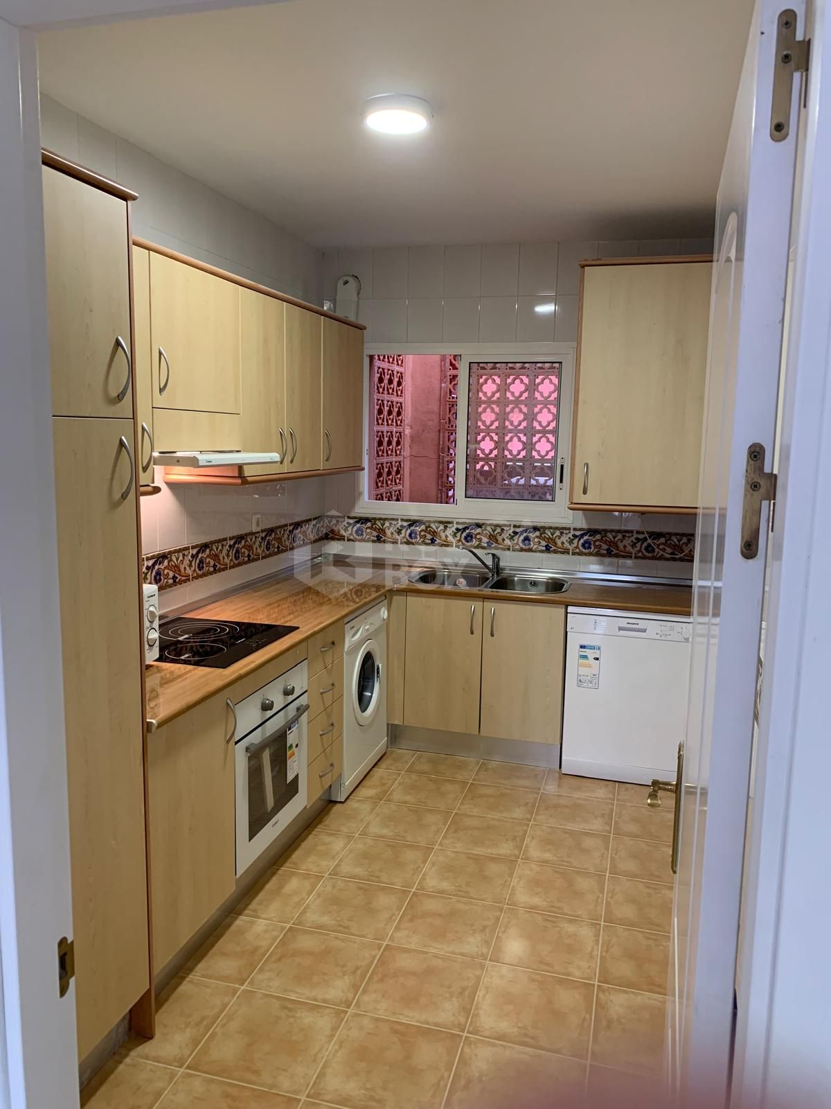 Elegant Two-Bedroom Apartment in Prestigious Gated Community