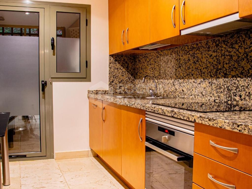 Ground-Floor Residence with Private Garden in the Exclusive Benatalaya Community, Estepona