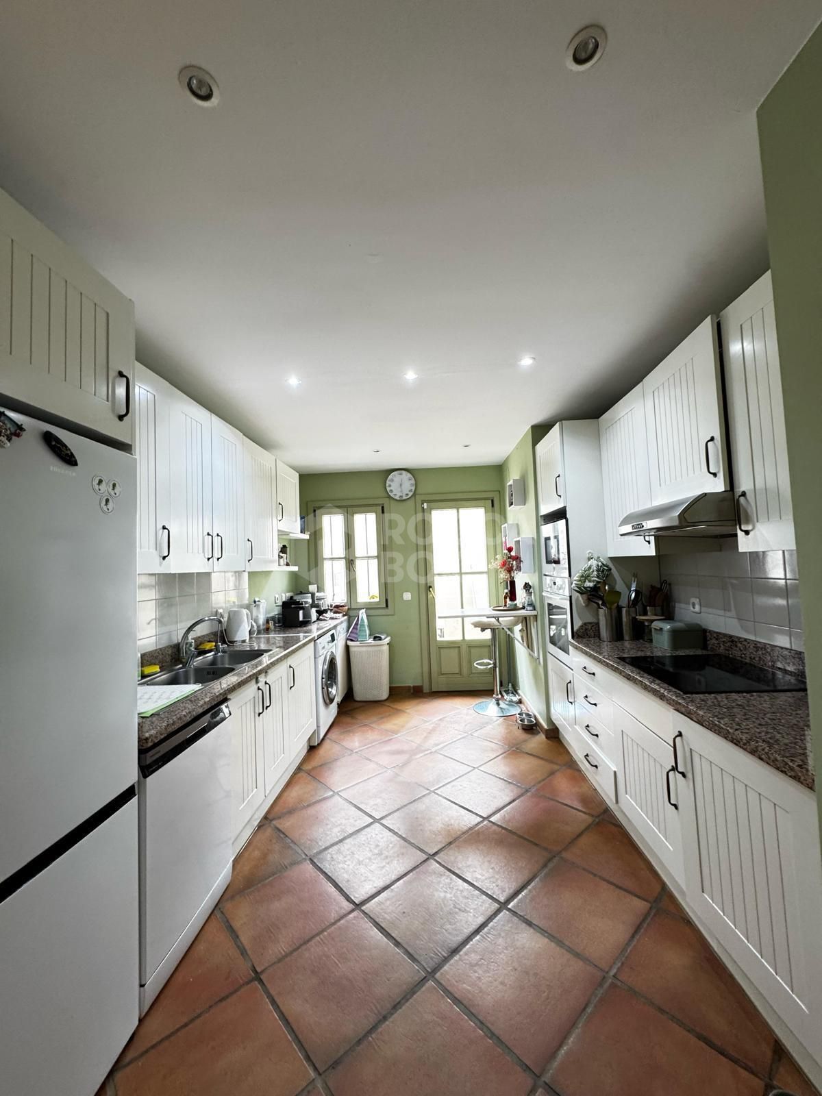 4-Bedroom Townhouse with Private Pool, Garden & Golf + Lake Views in Sotogrande