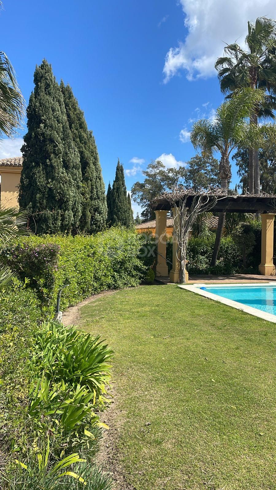 4-Bedroom Townhouse with Private Pool, Garden & Golf + Lake Views in Sotogrande