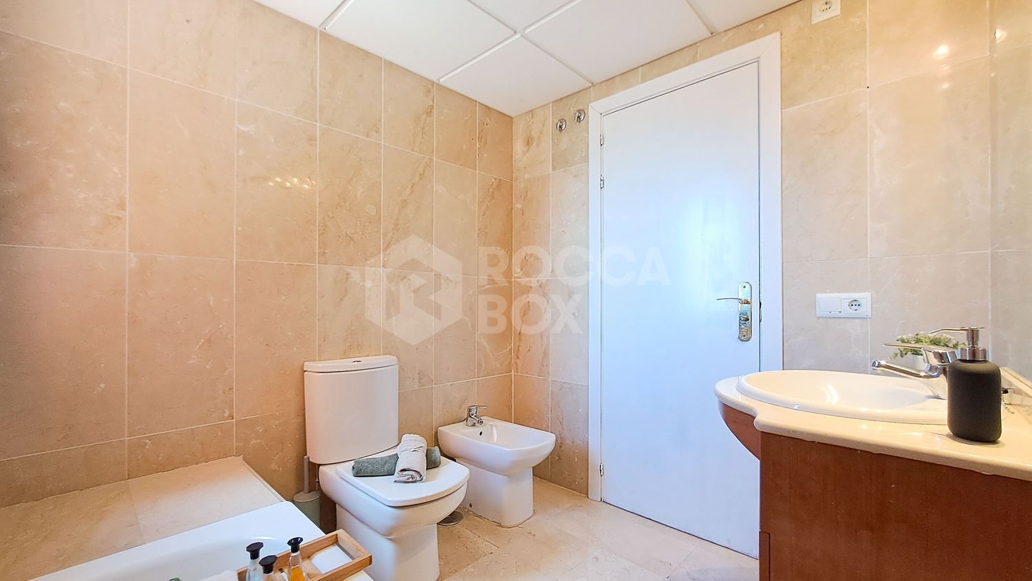 Apartment Steps from Estepona Promenade with Pool & Garden Views