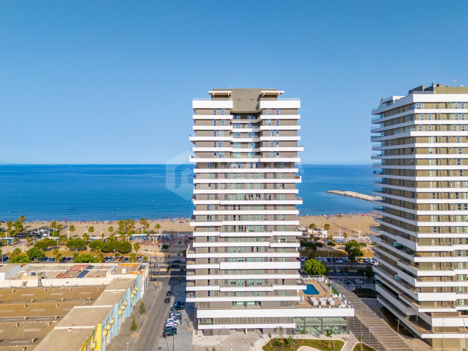 Exclusive Beachfront 4-Bedroom Residence with Breathtaking Sea Views & Amenities at Malaga Towers