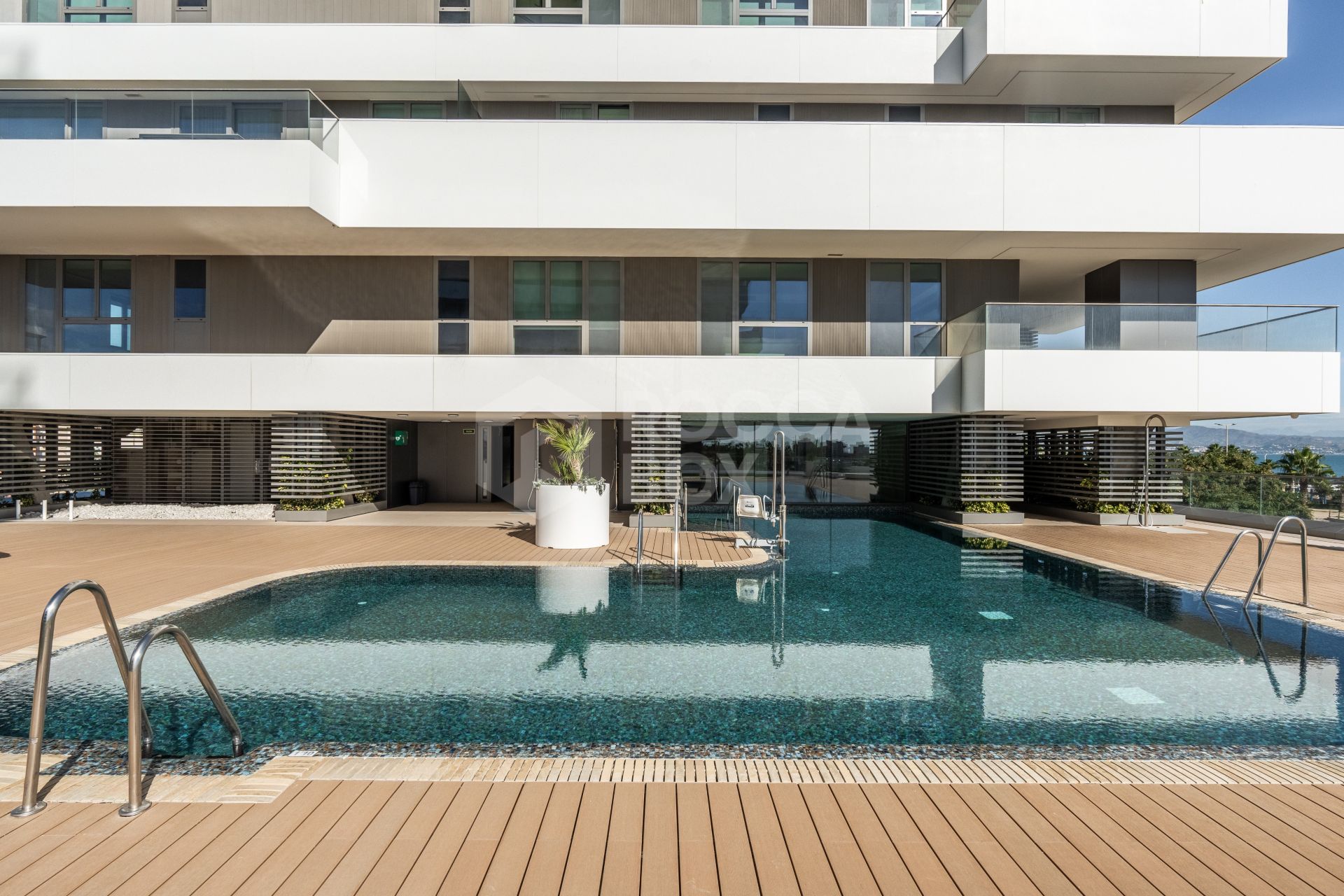 Exclusive Beachfront 4-Bedroom Residence with Breathtaking Sea Views & Amenities at Malaga Towers