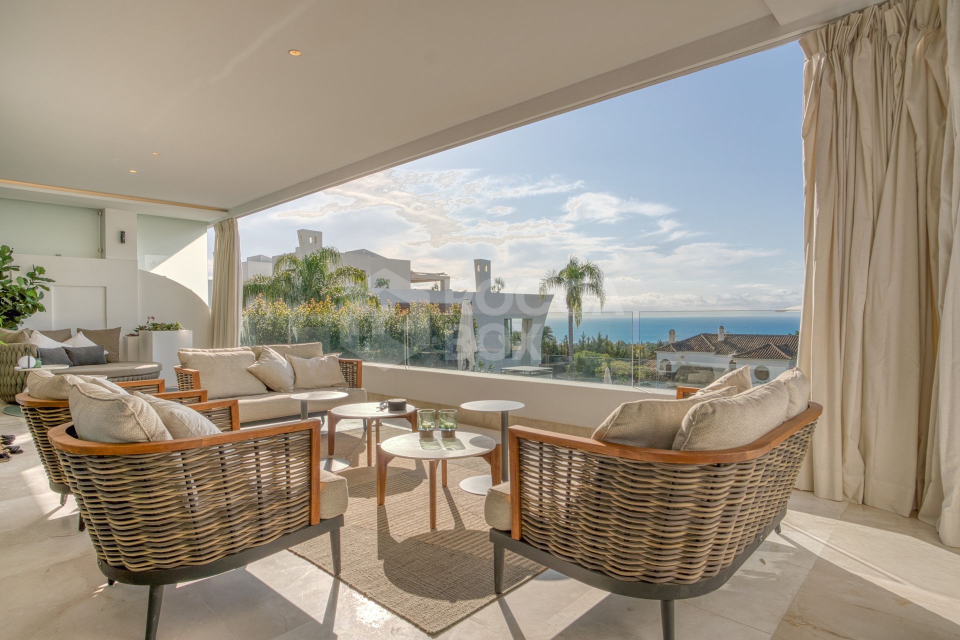 Elegant 4-Bedroom Designer Duplex with Sea Views in La Reserva de Sierra Blanca