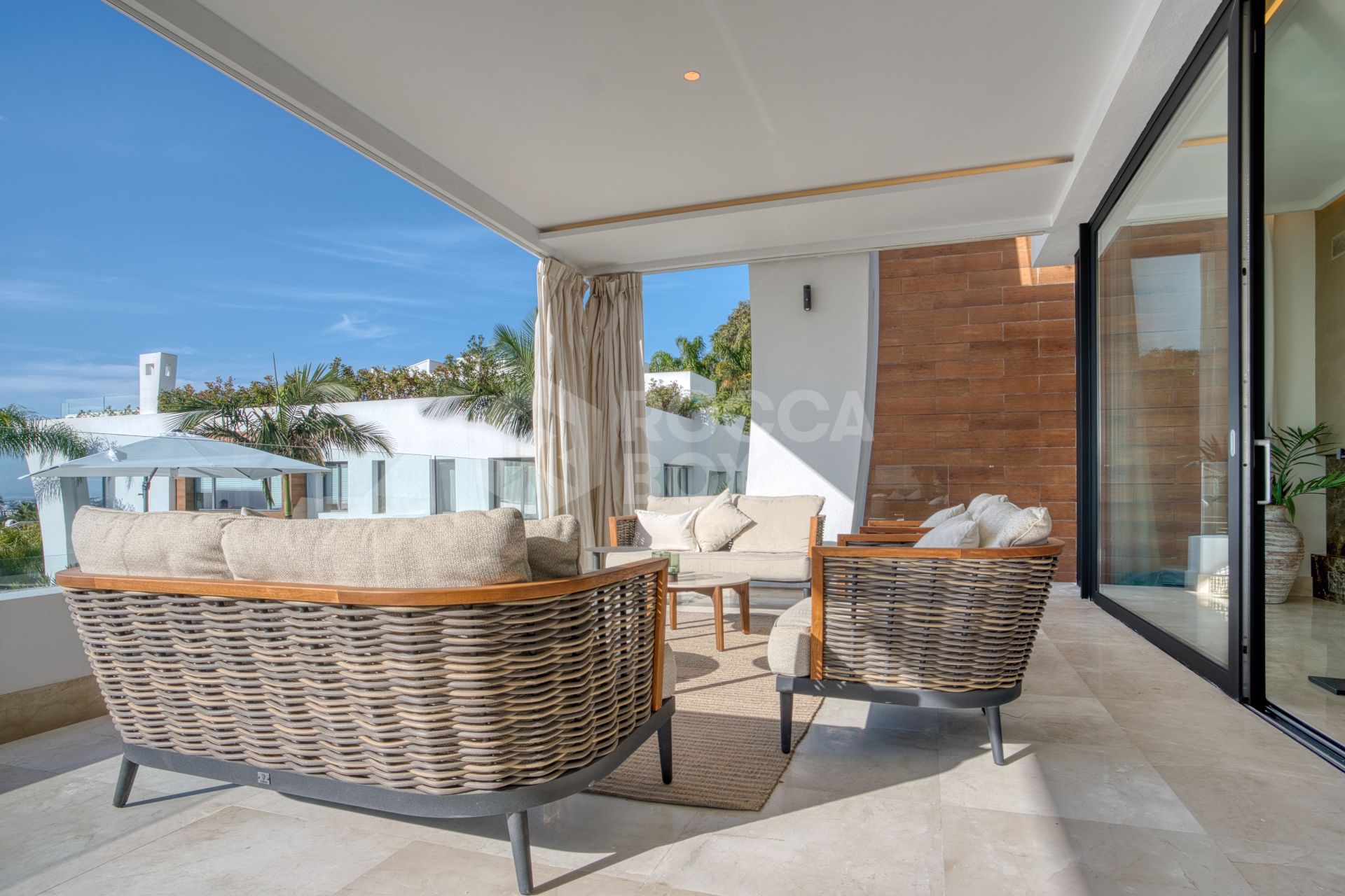 Elegant 4-Bedroom Designer Duplex with Sea Views in La Reserva de Sierra Blanca