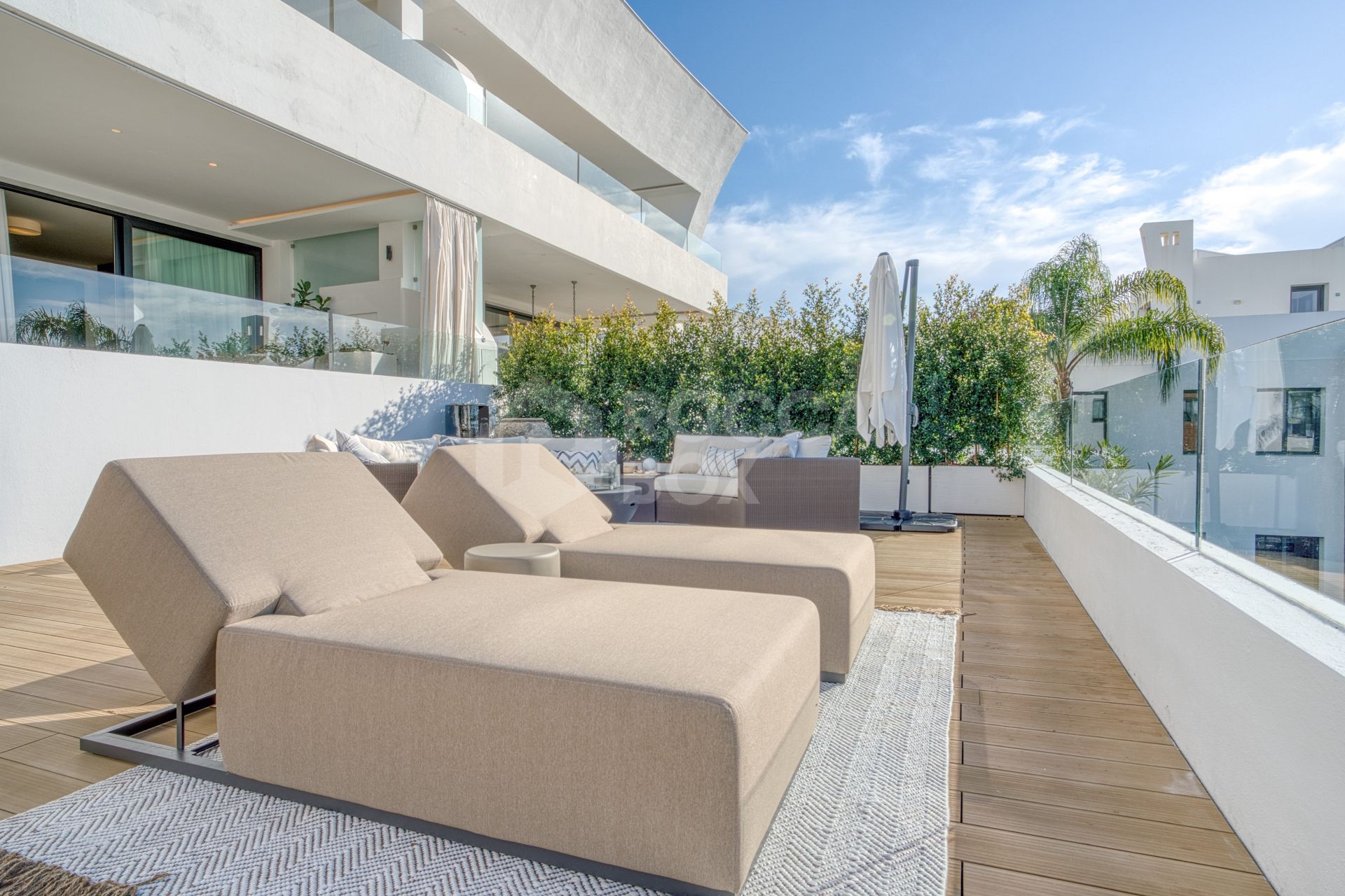 Elegant 4-Bedroom Designer Duplex with Sea Views in La Reserva de Sierra Blanca