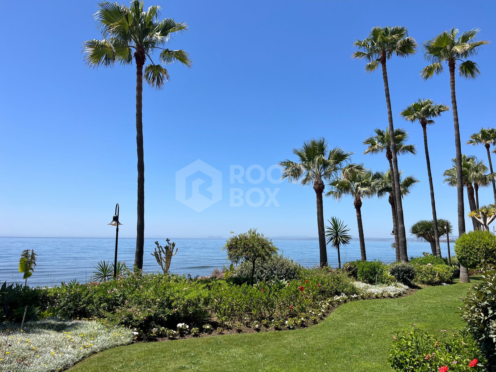 Newly Renovated Beachfront Ground-Floor Apartment with Private Terrace & Sea Views
