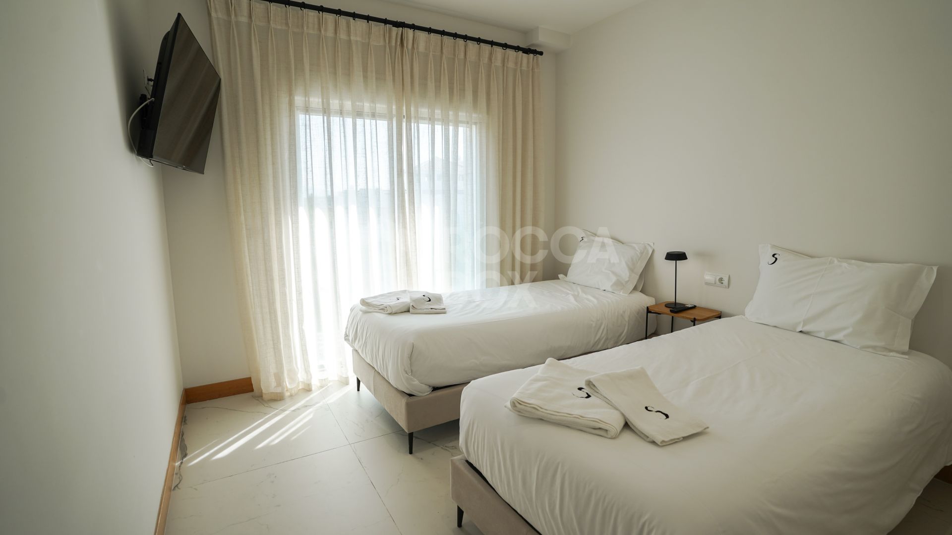 Long-term rental 2-bedroom apartment with large terrace, new construction.