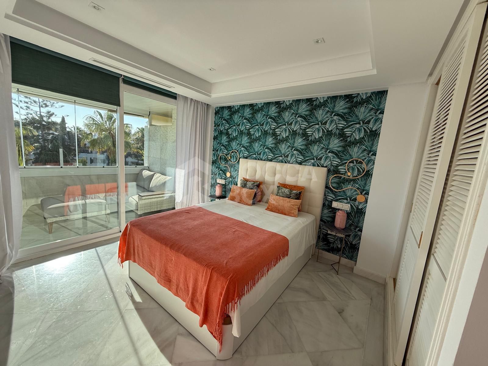 Luxury Beachfront Apartment with Panoramic Views in Prime Location