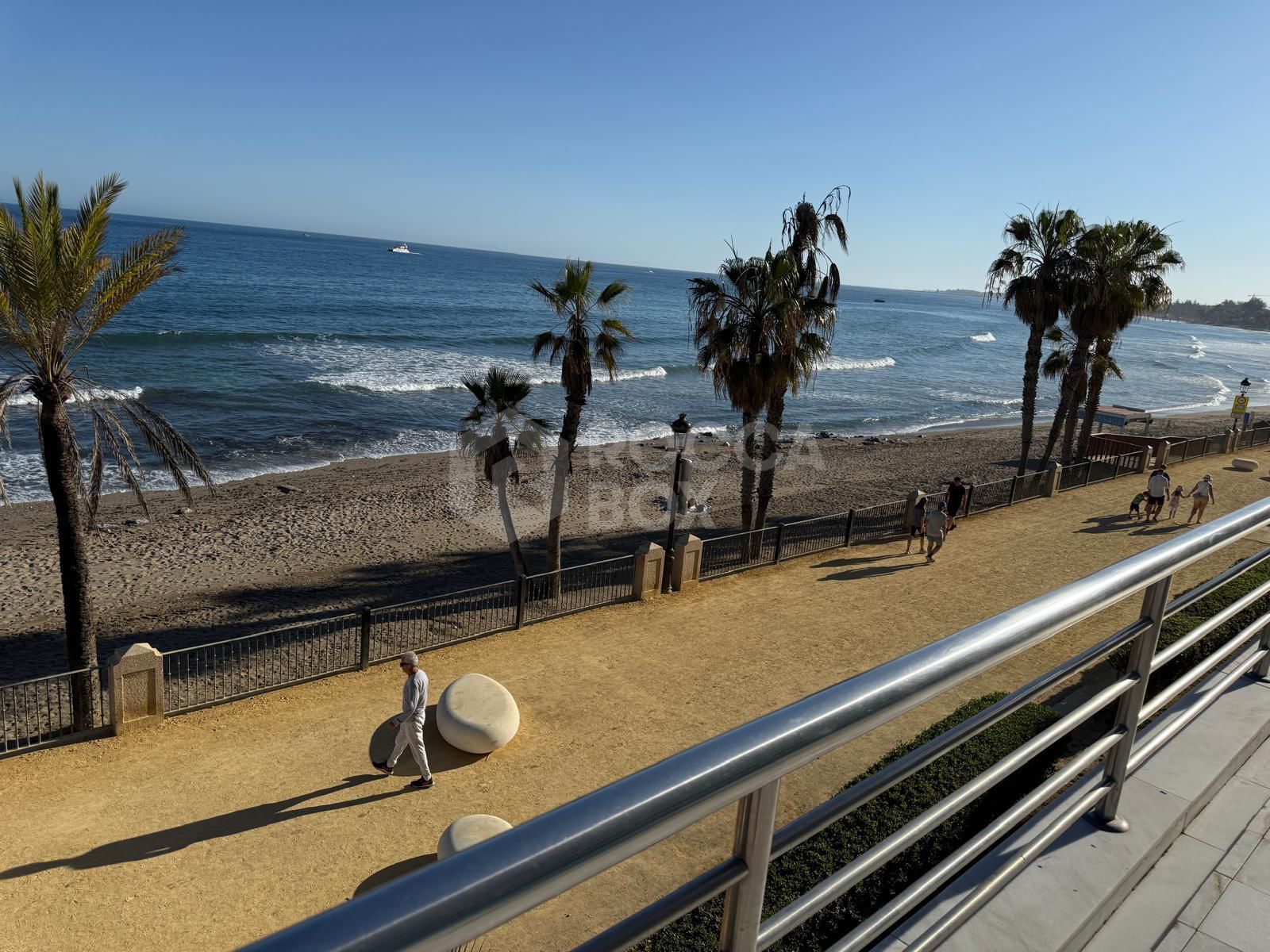 Luxury Beachfront Apartment with Panoramic Views in Prime Location